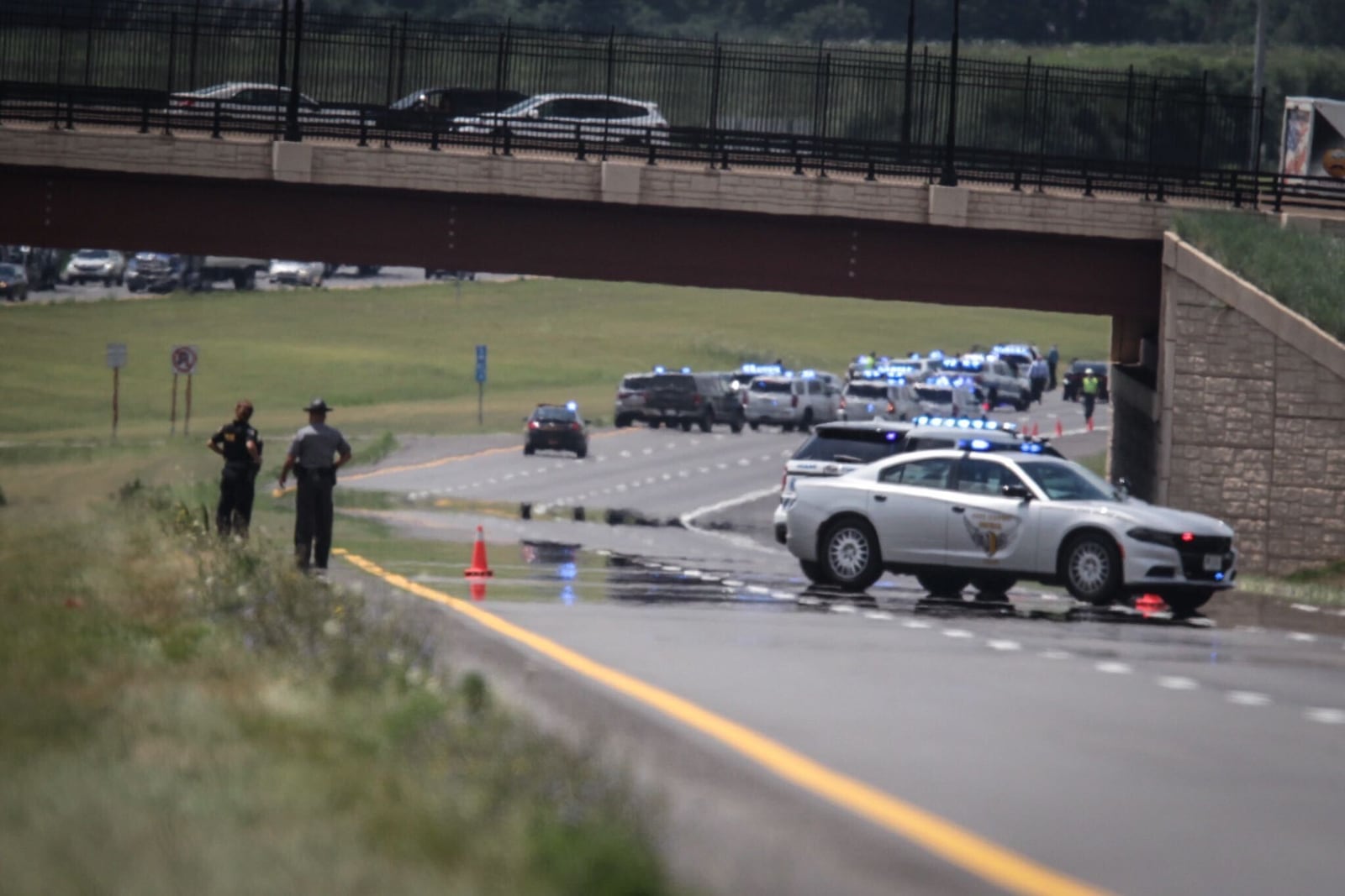 Ohio State Highway Patrol responded to a shooting reported on I-75 near the Warren-Montgomery County border Monday afternoon. STAFF PHOTO / JIM NOELKER