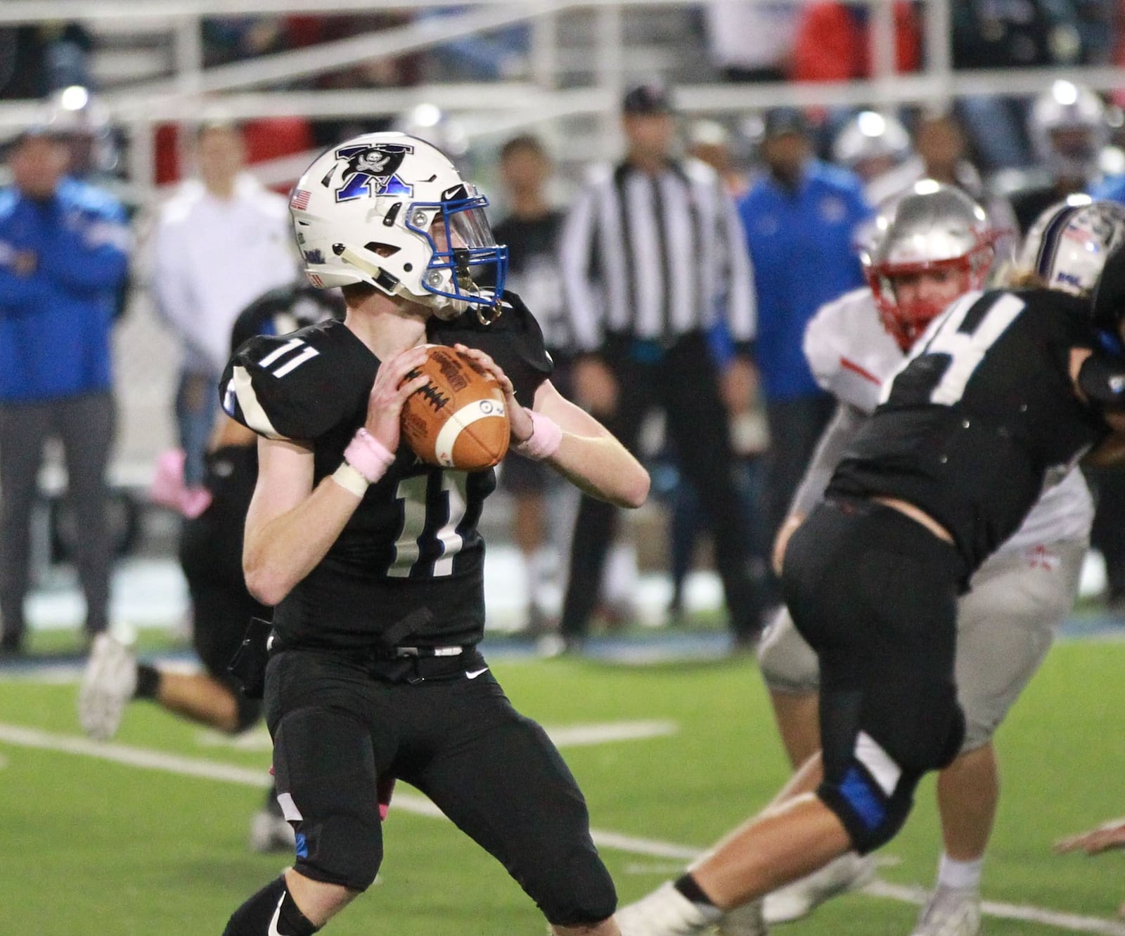 Xenia QB Brett Russell looks for a receiver. Xenia defeated visiting Troy 24-22 in a Week 9 high school football game on Friday, Oct. 25, 2019. MARC PENDLETON / STAFF