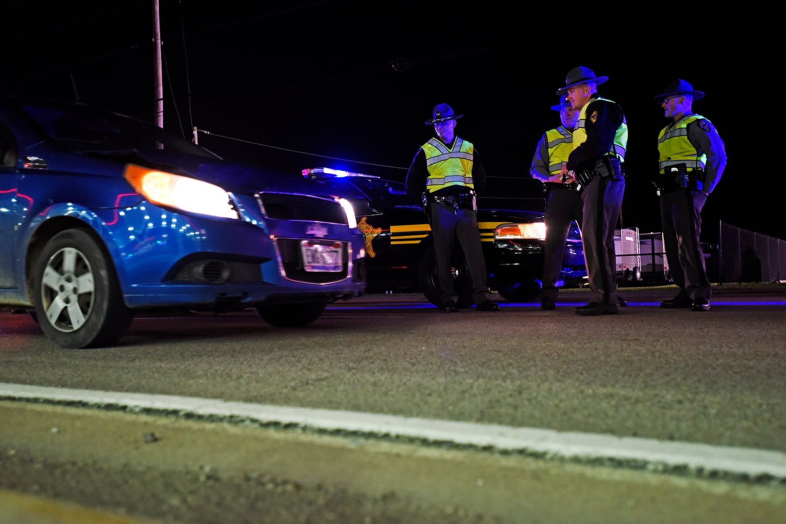 The Butler County OVI Task Force along with the Ohio State Highway Patrol, the Butler County Sheriff’s office and other local law enforcement agencies set up a sobriety checkpoint to check for impaired drivers Friday, Nov. 20 on US-127 in New Miami. NICK GRAHAM/STAFF