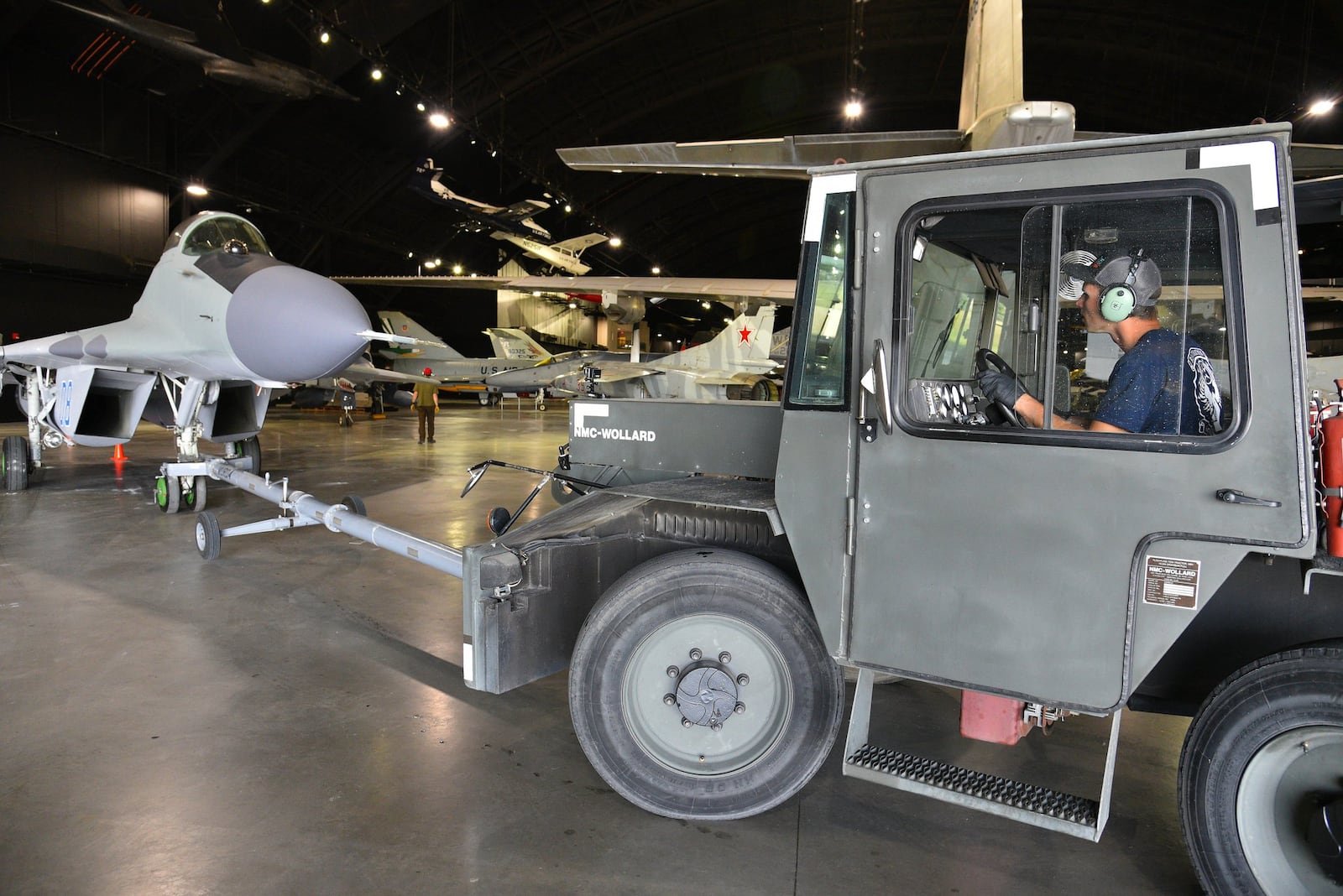 Museum restoration specialist Jason Davis tows the Mikoyan-Gurevich MiG-29A into position during the Cold War Gallery aircraft moves. CONTRIBUTED/U.S. AIR FORCE/KEN LAROCK