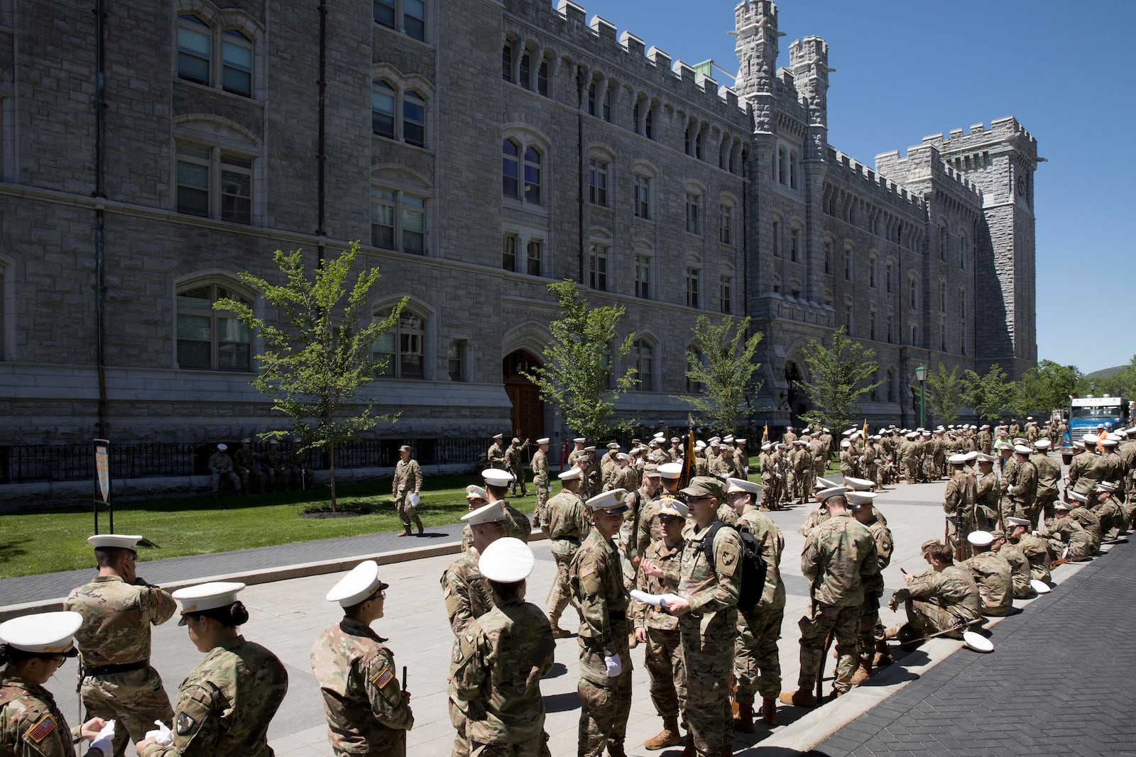 FILE - Army cadets drill at the U.S. Military Academy at West Point, N.Y., Wednesday, May 22, 2019. (AP Photo/Mark Lennihan, File)