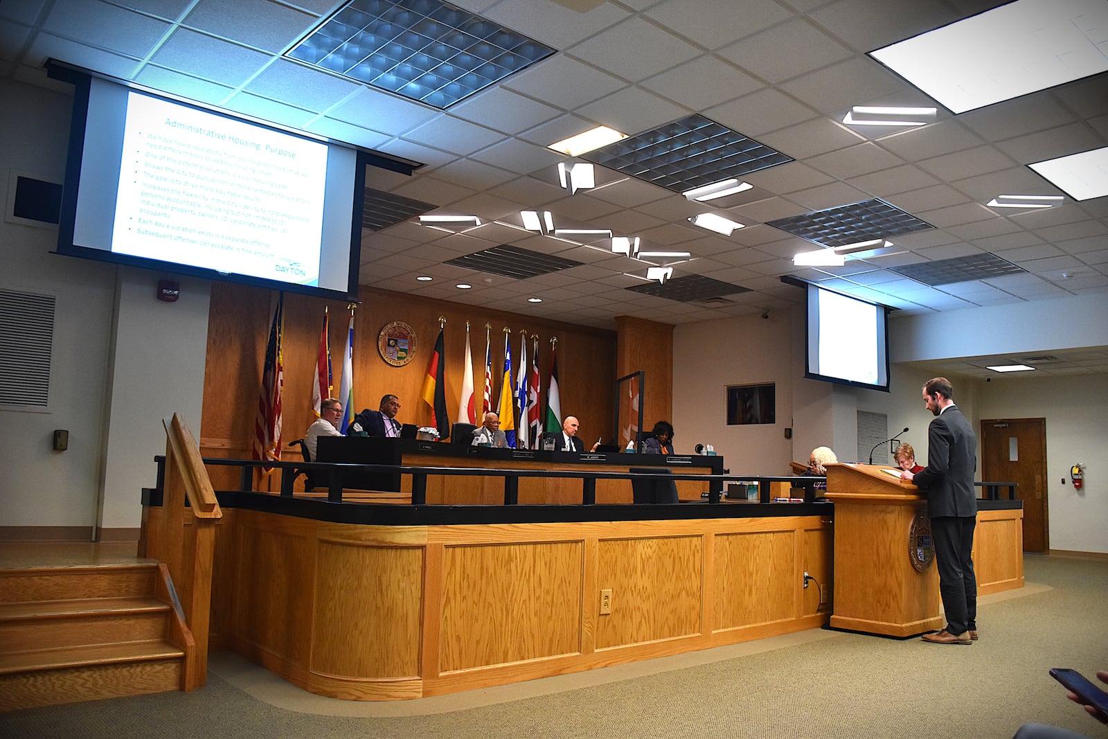 Greg Parker, assistant city attorney with the city of Dayton, speaks before the Dayton City Commission at a commission meeting last month. CORNELIUS FROLIK / STAFF