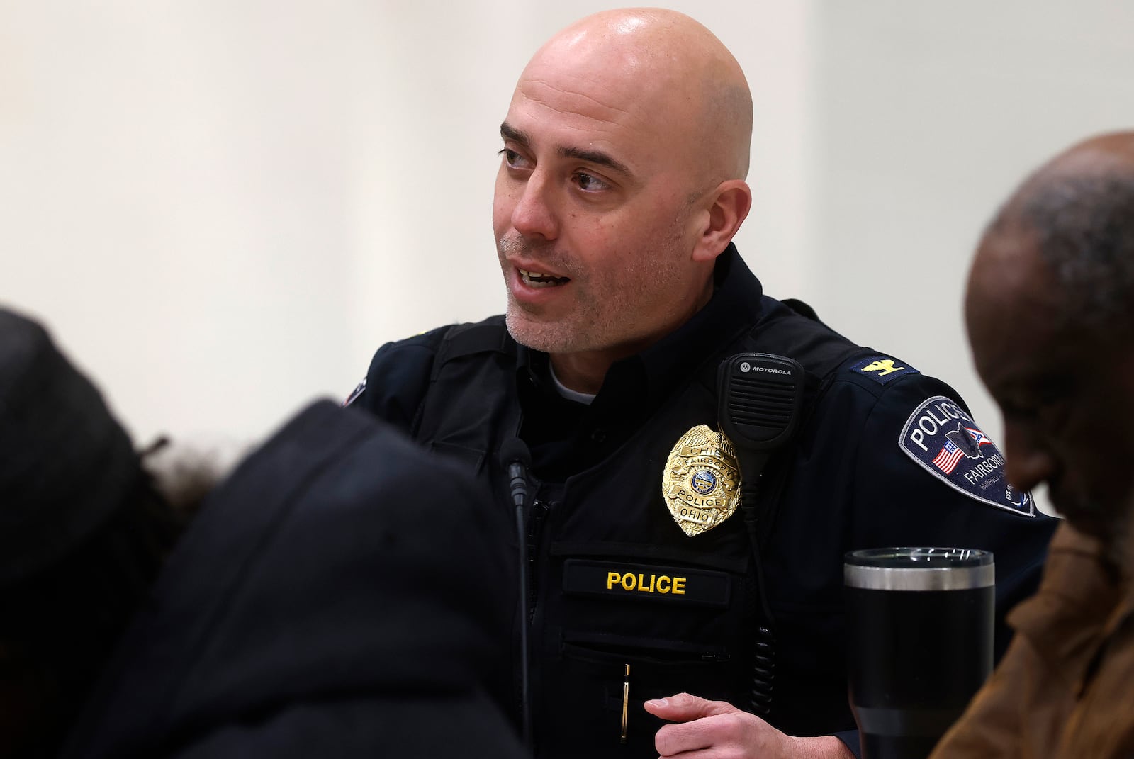 Fairborn Police Chief Ben Roman with other city leaders and residents discuss the future of marijuana sales during public forum Monday night, Jan. 28, 2025, at Fairborn High School. MARSHALL GORBY\STAFF