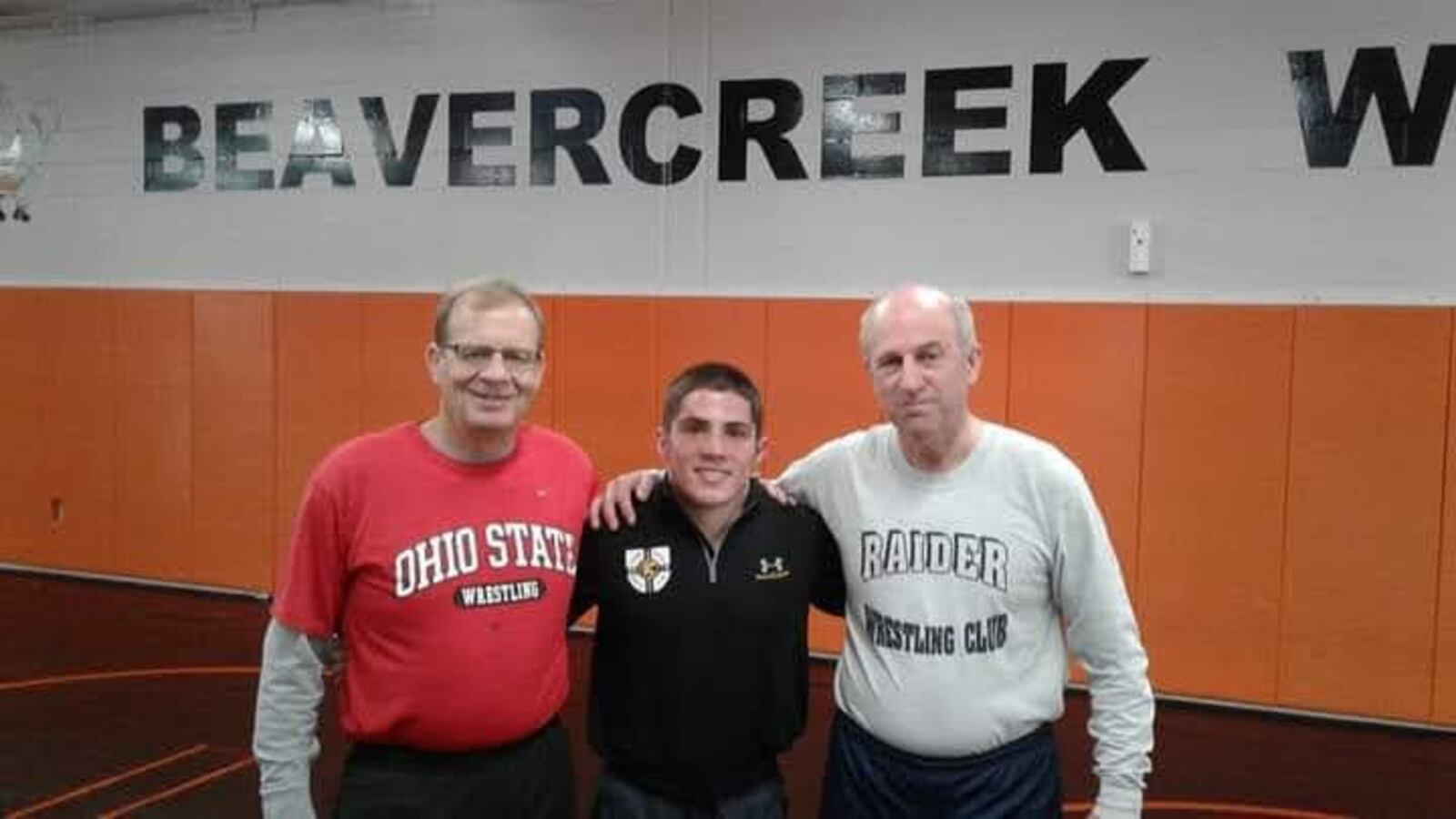 From left, Beavercreek High School coach Gary Wise; Ohio State wrester, 4-time All American, 4-time Big Ten champ and NCAA champion Nathan Tomasello; and Mark Gerhard. CONTRIBUTED