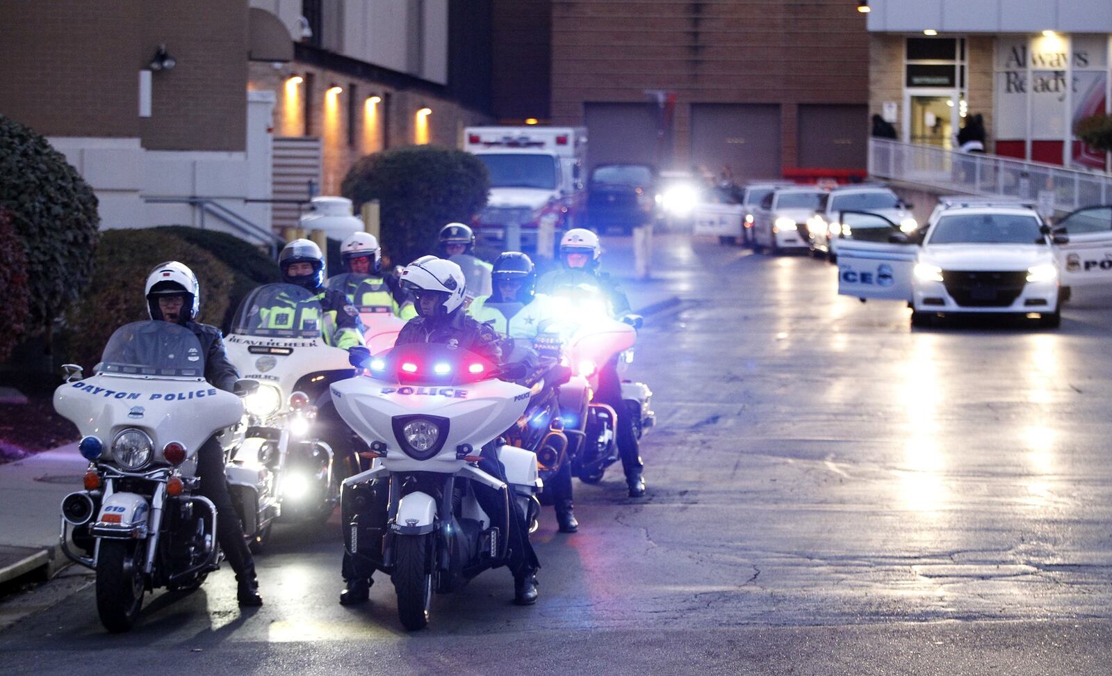 The body of detective Jorge DelRio was escorted from Grandview Hospital by a procession of police vehicles to the Montgomery County Coroner’s Office Thursday evening. DelRio was shot twice and critically injured Monday evening while serving a drug-related warrant as part of a DEA task force. LISA POWELL / STAFF