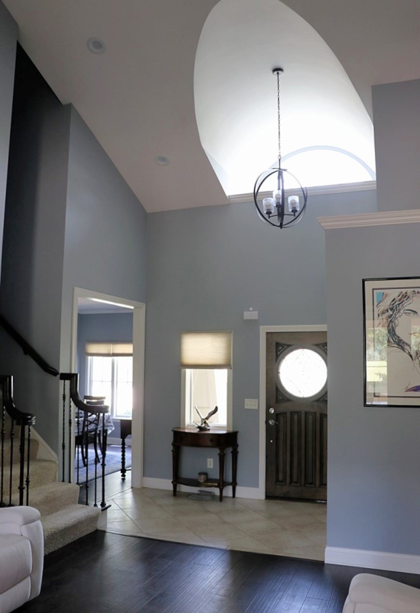 The formal entry opens into a two-story foyer with a barrel ceiling. Contributed by Kathy Tyler 