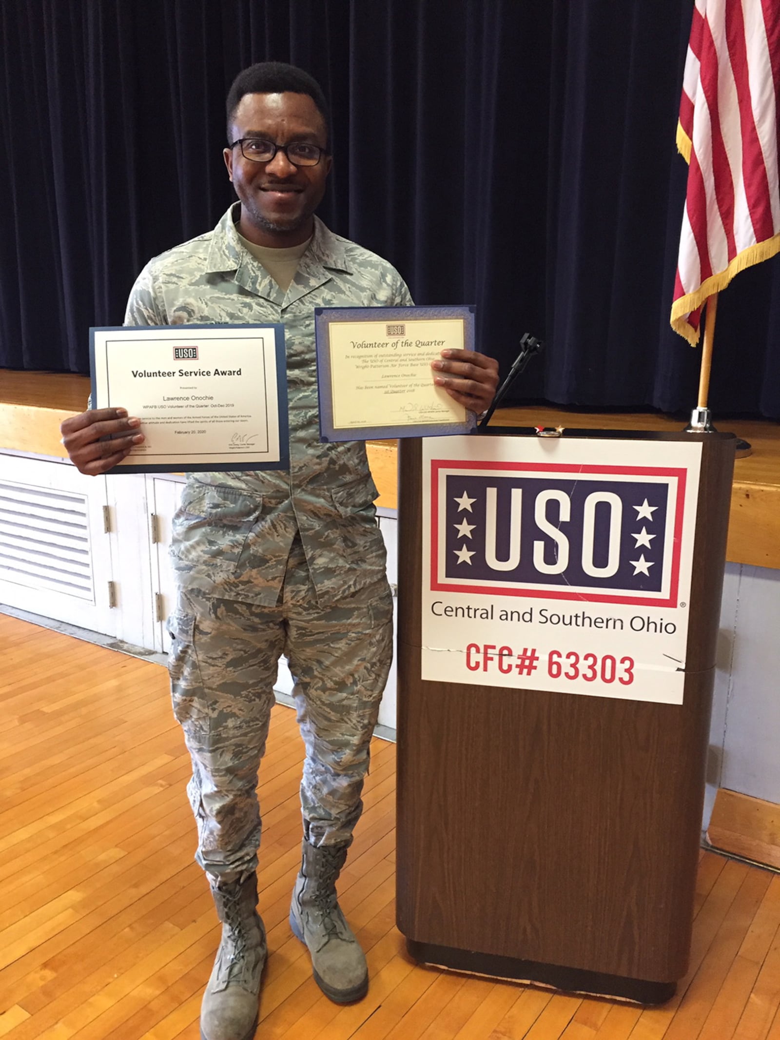 Senior Airman Lawrence Onochie, a biomedical equipment repair technician at the 88th Medical Group, Wright-Patterson Air Force Base, shows two certificates he’s been given for his two years of devoted service as a USO volunteer on base. Onochie has been selected as one of seven USO Volunteers of the Quarter for the first quarter of 2020 worldwide. SKYWRIGHTER PHOTO/AMY ROLLINS