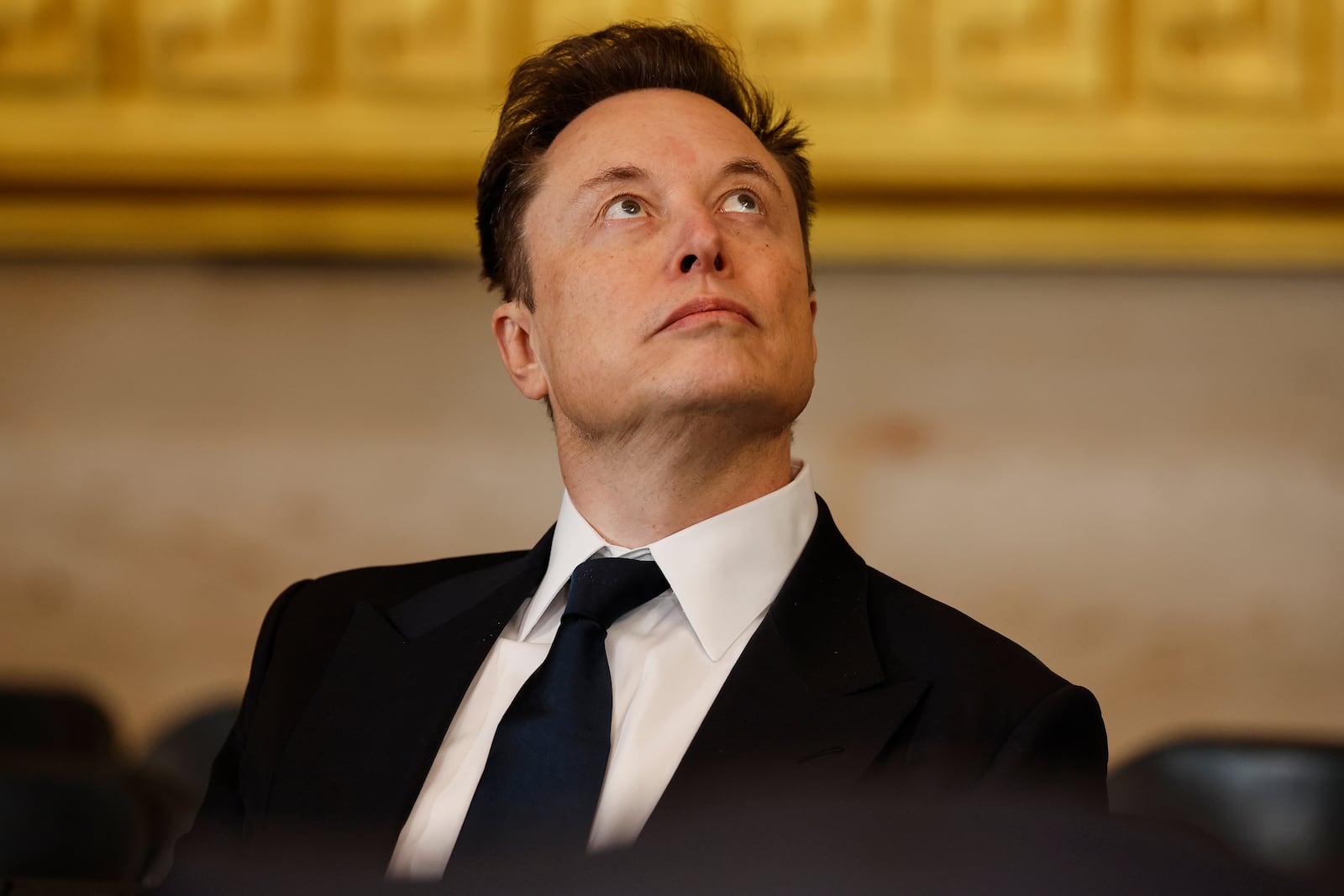 Elon Musk arrives before the 60th Presidential Inauguration in the Rotunda of the U.S. Capitol in Washington, Monday, Jan. 20, 2025. (Chip Somodevilla/Pool Photo via AP)