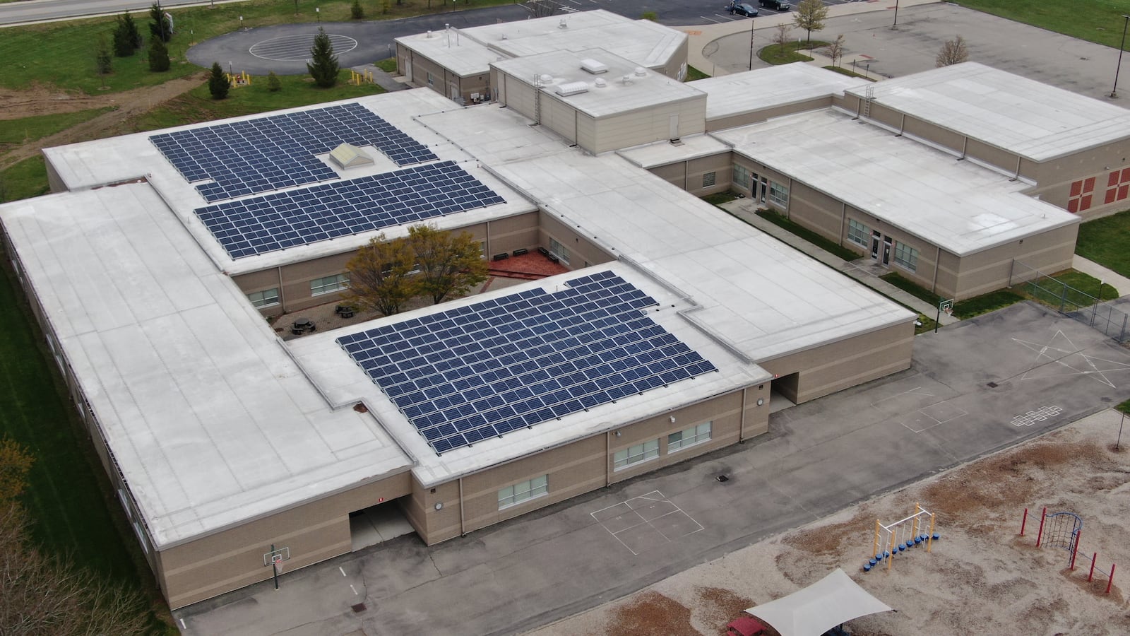 New Lebanon elementary and high schools had solar panels installed on their roofs to cut energy cost.