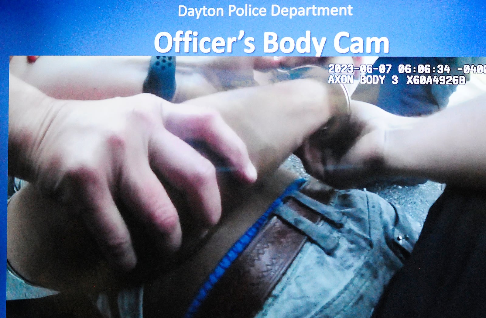 A photo from a body cam video from Dayton Police showing officers trying to restrain a man. Dayton police are investigating the use of force incident involving two of the department’s officers. This comes after police have been told a man involved is not expected to survive. MARSHALL GORBY\STAFF