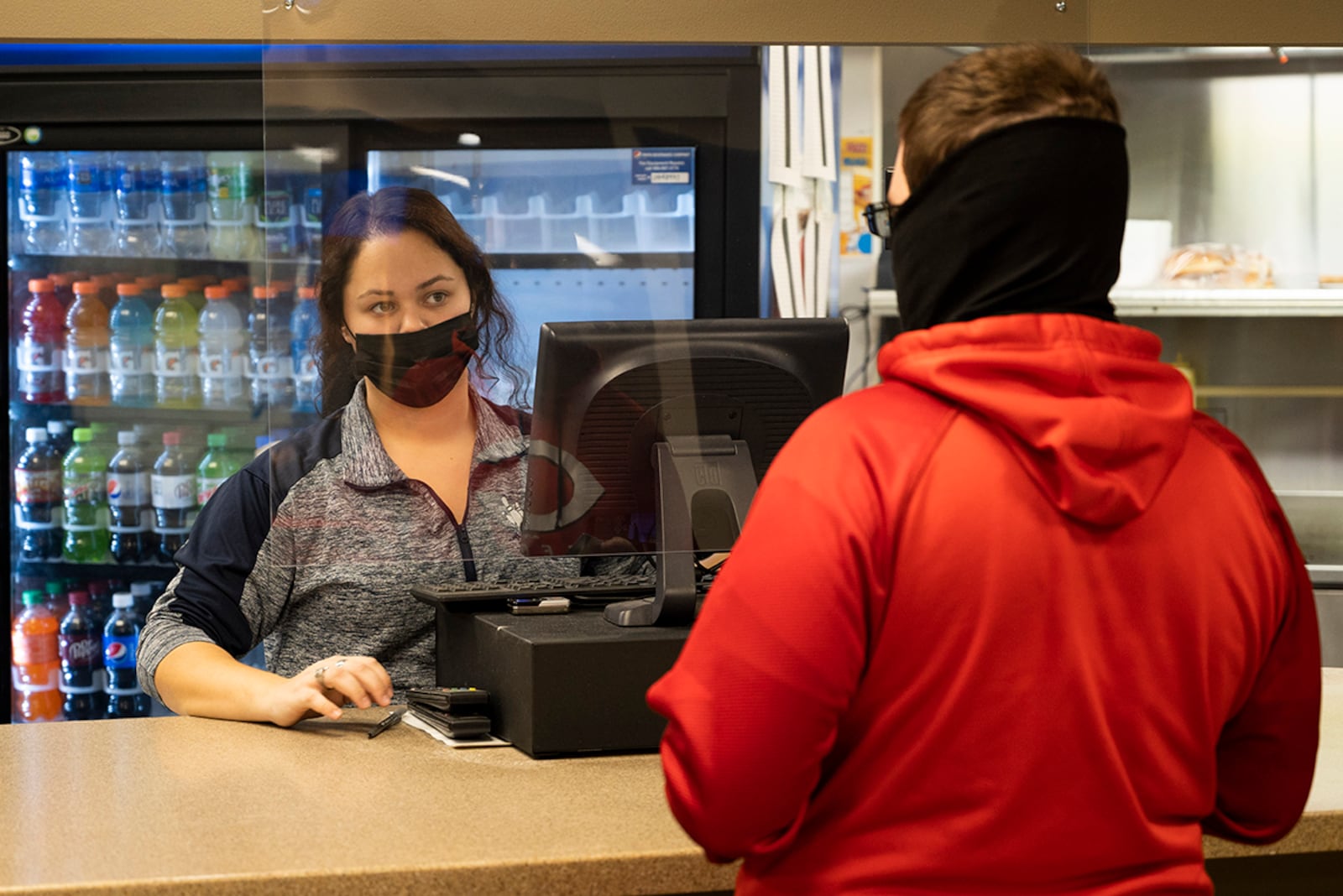 Audrey Renner, 88th Force Support Squadron recreational aid, takes a customer’s order Dec. 8 in the Kittyhawk Lanes snack bar at Wright-Patterson Air Force Base. U.S. AIR FORCE PHOTO/WESLEY FARNSWORTH