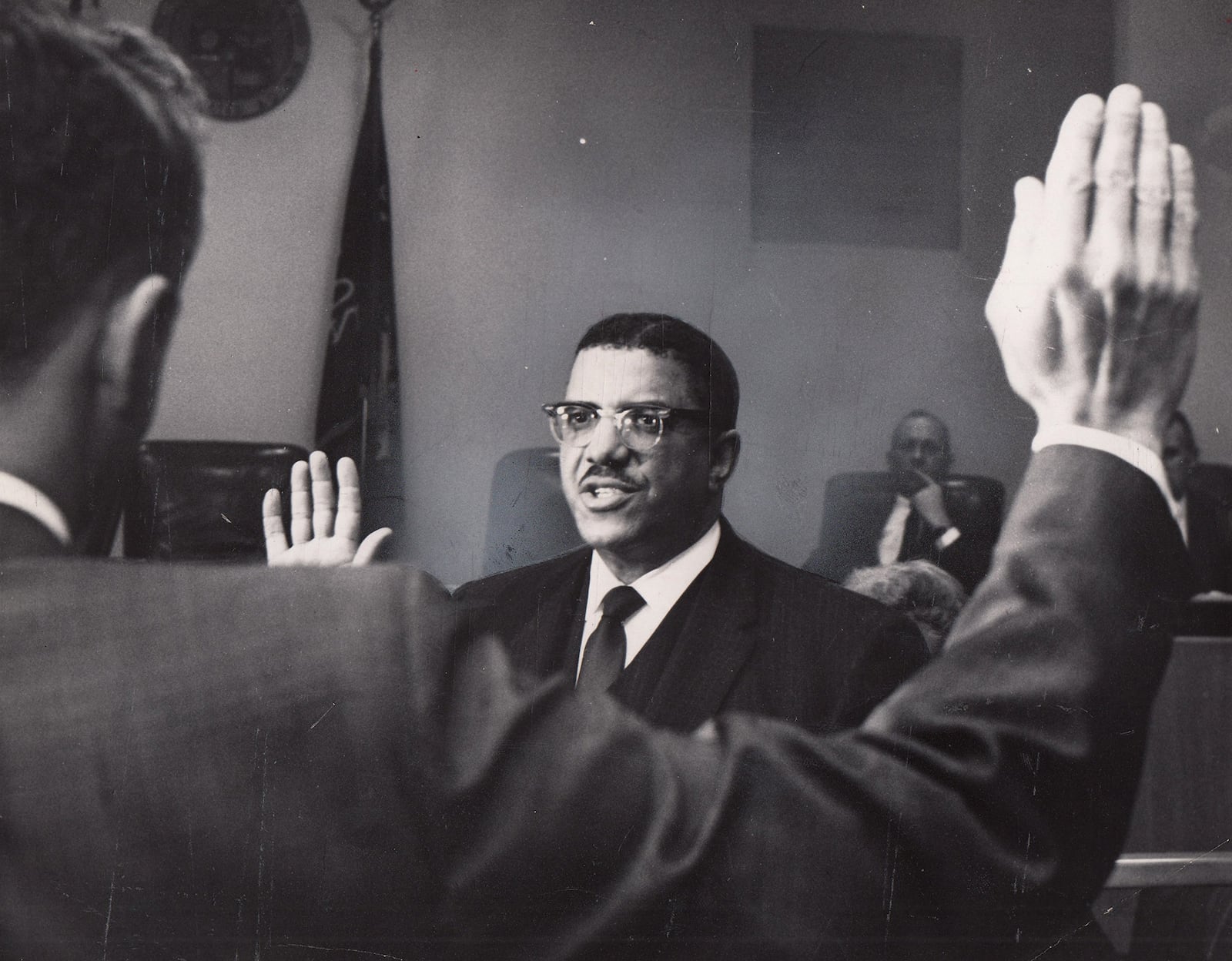 James H. McGee is sworn in as a Dayton city commissioner in 1967. Three years later he would become the city's first black mayor. DAYTON DAILY NEWS ARCHIVE