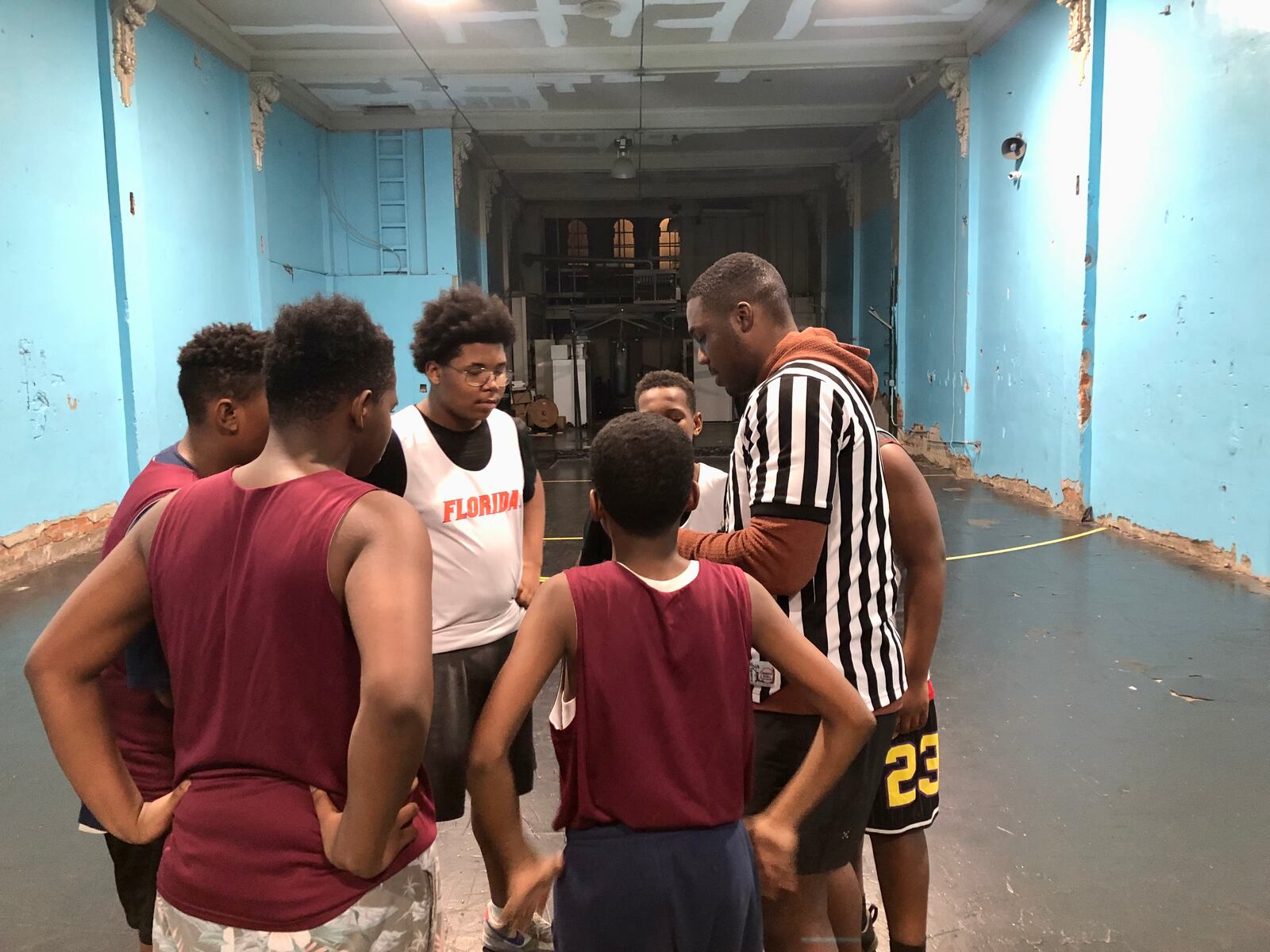 Haji Dunn talks to a group of Victory Project students. He has been a volunteer with the organization for three years. CONTRIBUTED