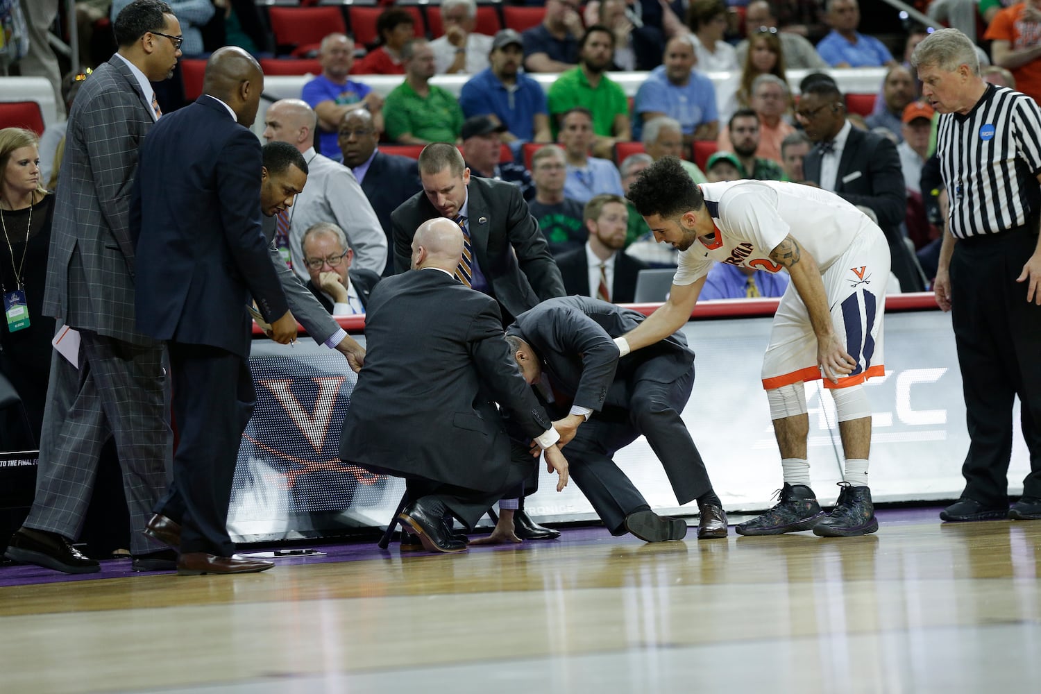 Virginia coach collapses at NCAA tourney