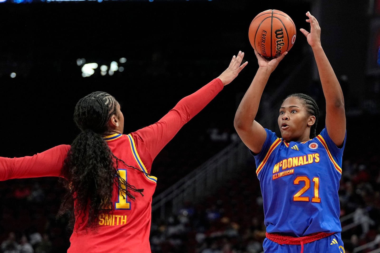 FILE - East forward Sarah Strong (21) shoots over West forward Kennedy Smith, left, during the first quarter of the McDonald's All-American girls' basketball game, April 2, 2024, in Houston. (AP Photo/Kevin M. Cox, File)