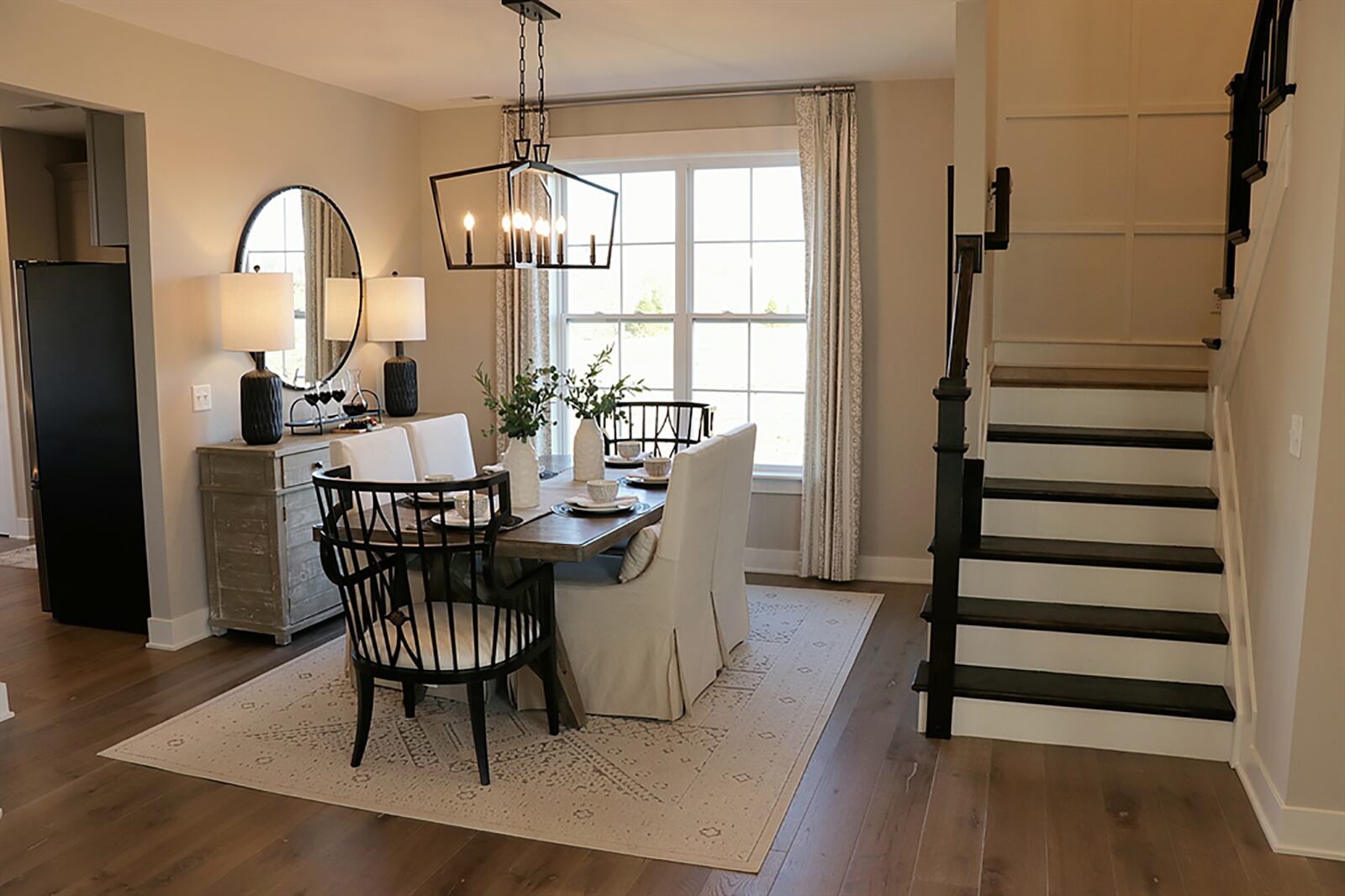 For the Ashlar design, formal entry opens from the covered front door into a foyer and parlor dining area. The kitchen is accessible to the formal dining room. CONTRIBUTED PHOTO BY KATHY TYLER