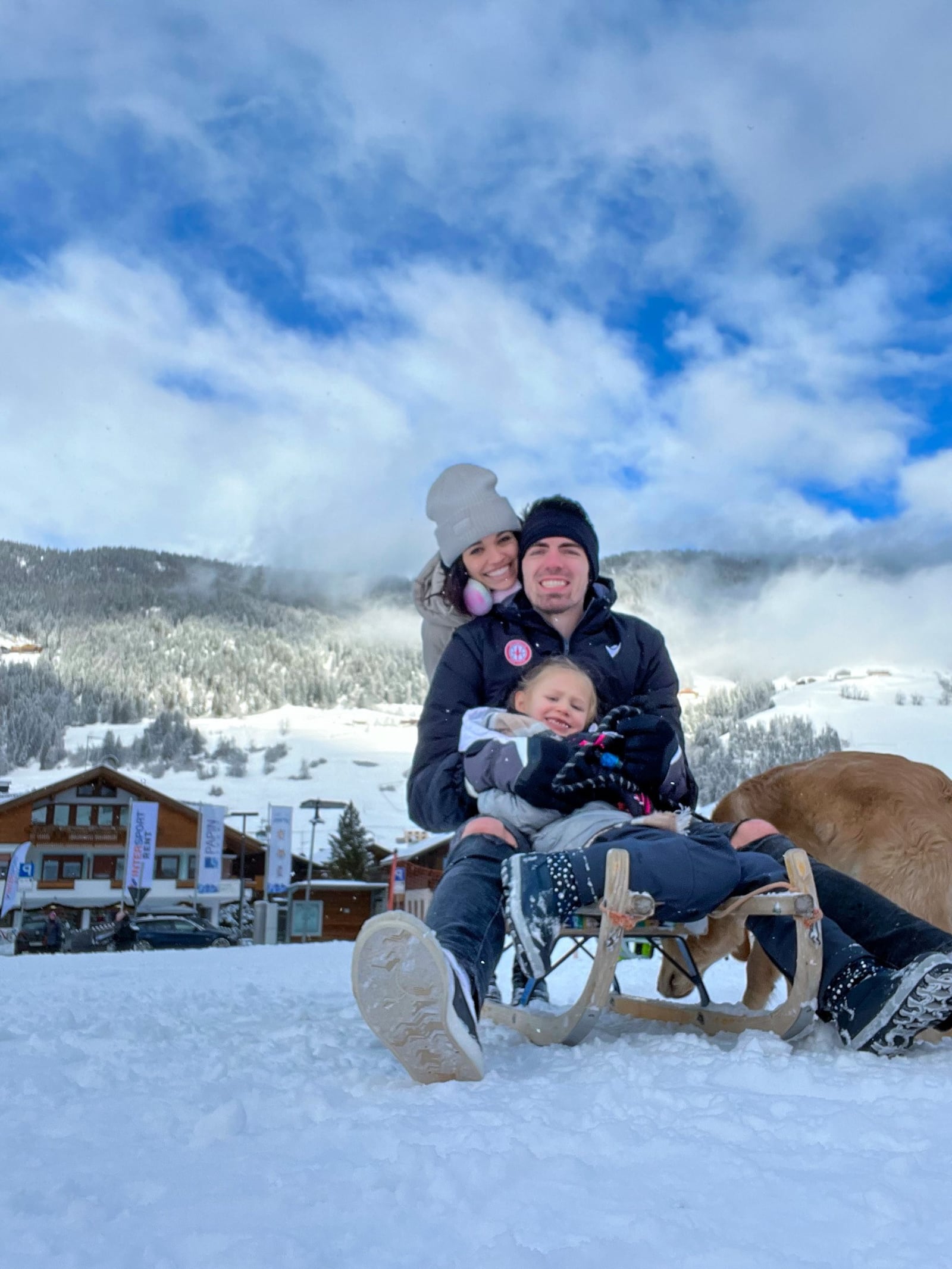 A.J. Pacher, his wife Abigail, daughter Addisen and their dog Burrow, named after the Cincinnati Bengals’ Joe Burrow, in San Candido in the Italian Alps. CONTRIBUTED