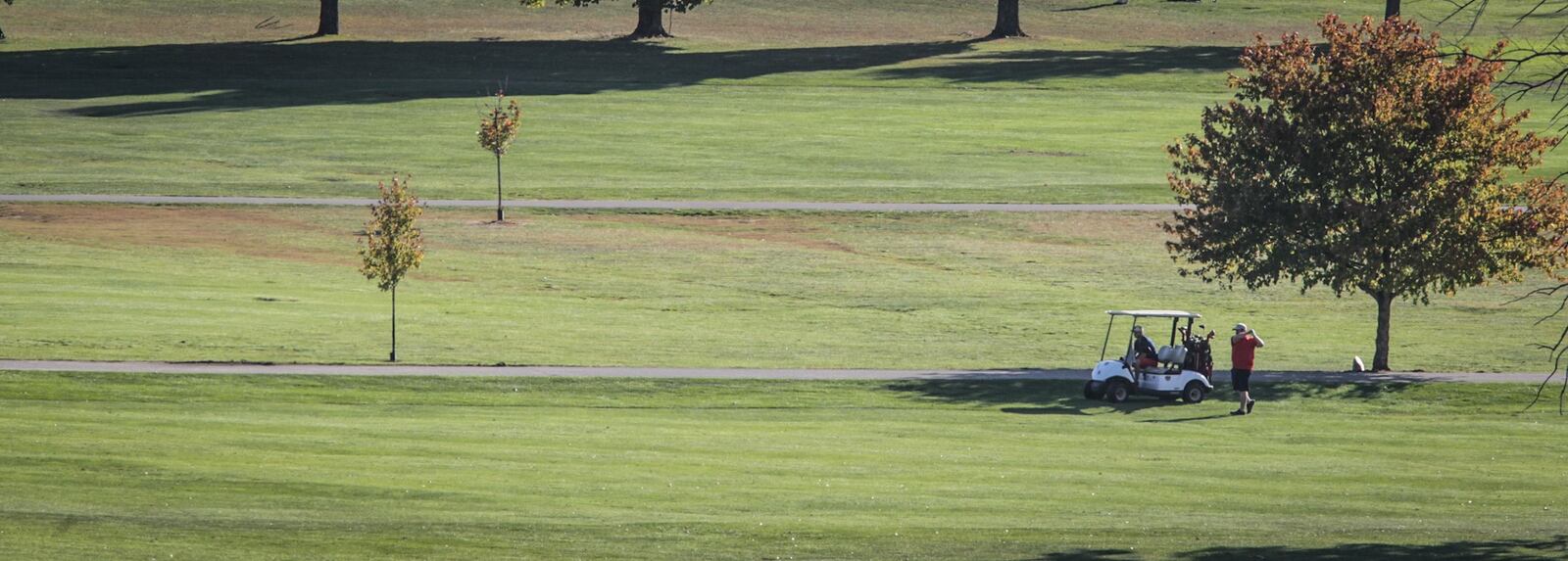 Golfers dotted the Community Golf Course in Kettering on a warm autumn afternoon. During COVID-19, many area golf courses stayed open but limited their services. JIM NOELKER/STAFF