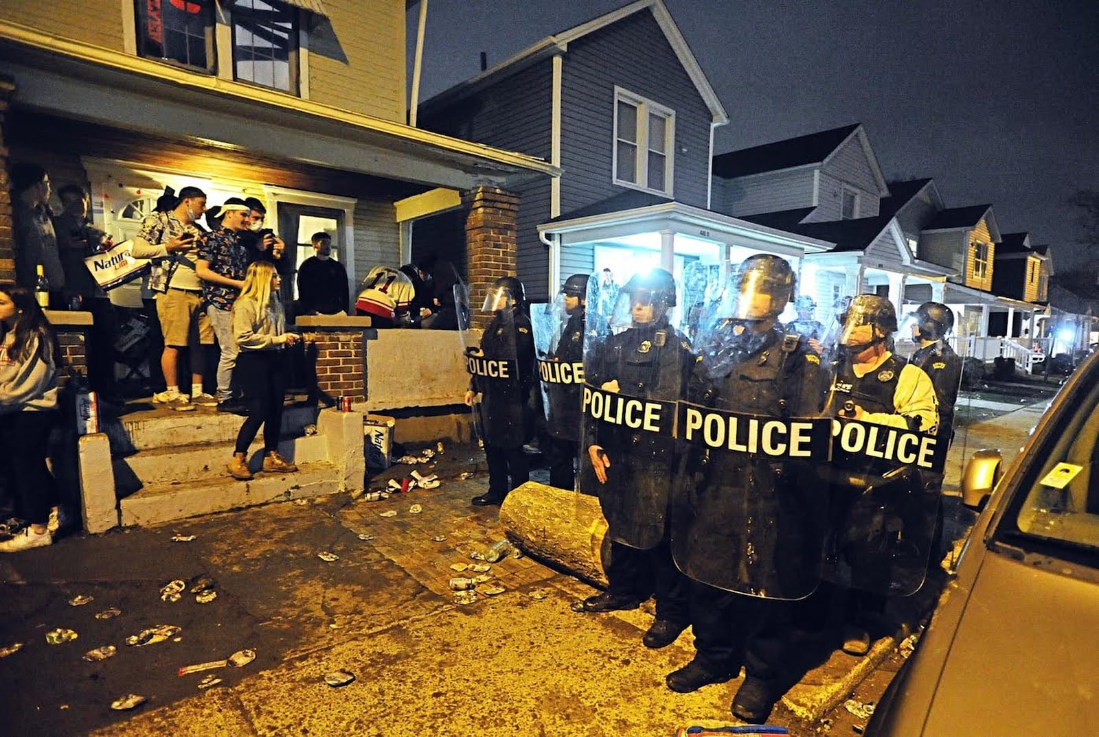 The University of Dayton Police and city of Dayton Police dispersed a large crowd of “disorderly” students Wednesday morning during a street party where about 1,000 students gathered. Authorities say students threw bottles and damaged vehicles during the incident. MARSHALL GORBY/ STAFF