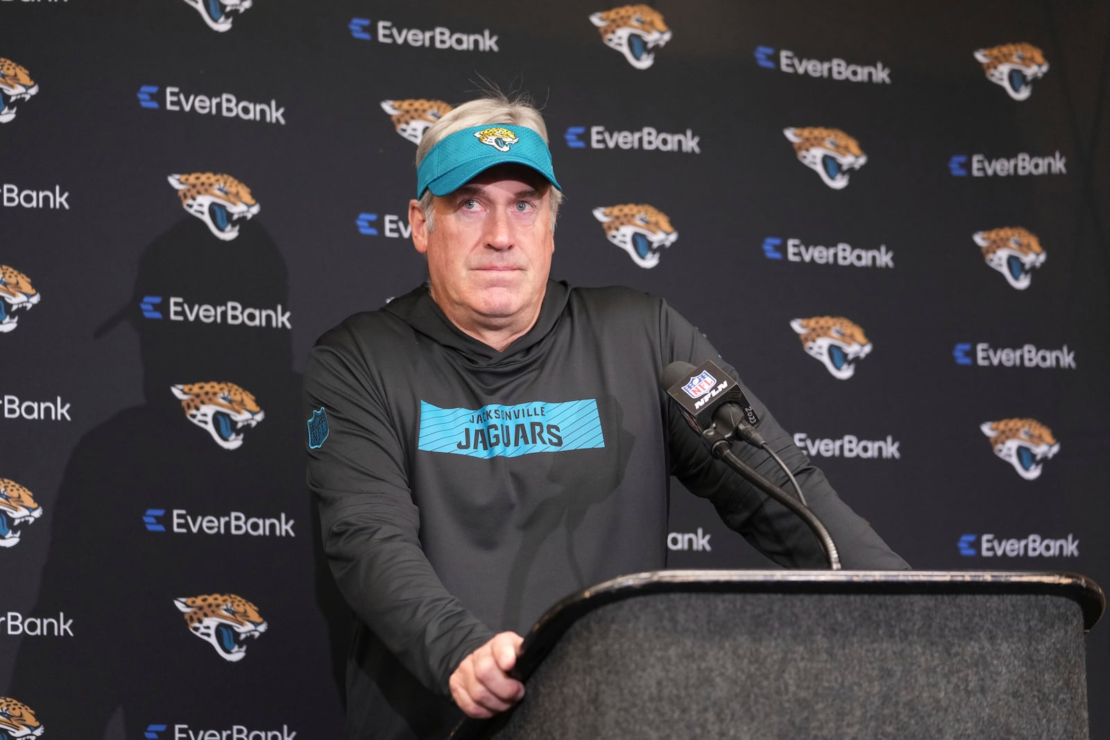 Jacksonville Jaguars head coach Doug Pederson pauses during a news conference after an NFL football game against the Indianapolis Colts, Sunday, Jan. 5, 2025, in Indianapolis. The Colts won 26-23 in overtime. (AP Photo/Michael Conroy)