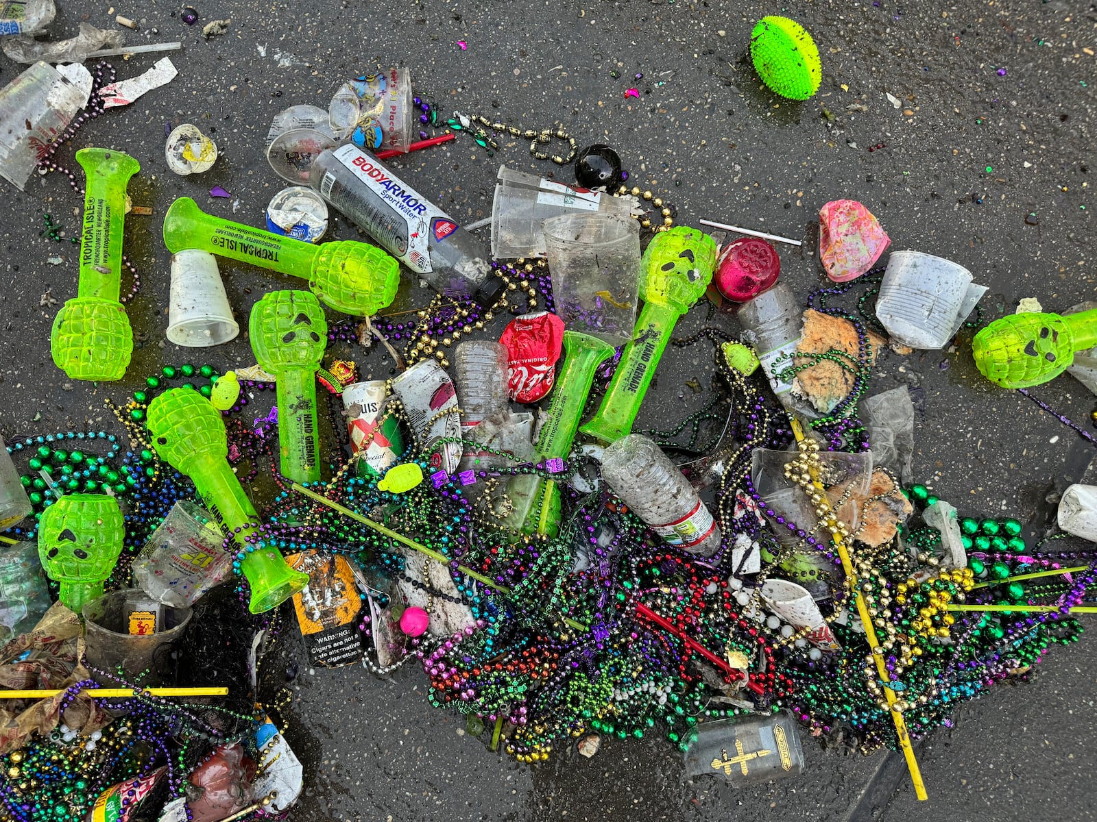 Detritus from Mardi Gras Day in New Orleans, lies scattered in the French Quarter on Ash Wednesday, March 5, 2025. (AP Photo/Jack Brook)