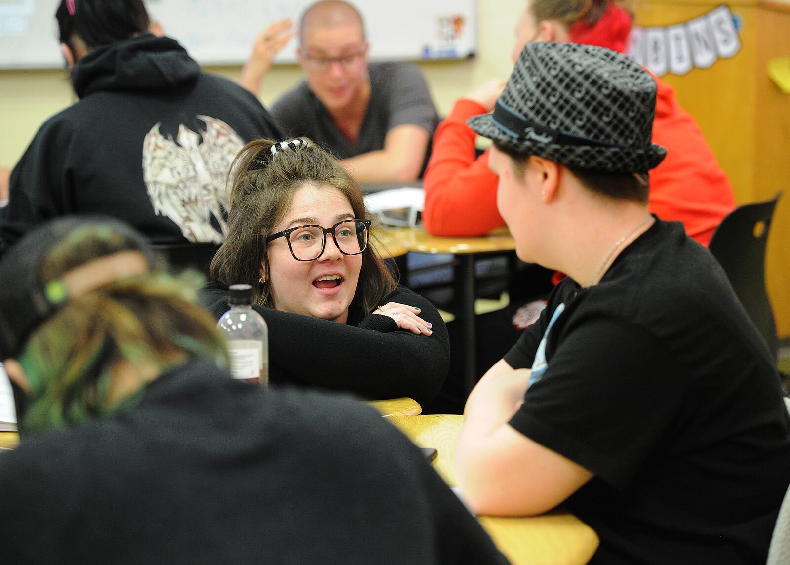 Wayne High School teacher Kaylee Robins teaches a financial literacy course that won an award from the Ohio State Treasurer last year. Huber Heights is one of the districts that has a financial literacy class requirement.  MARSHALL GORBY\STAFF