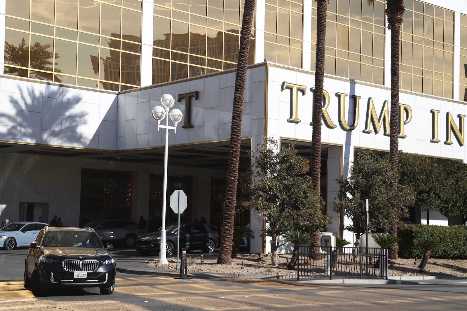 A car drives out of Trump International Hotel in Las Vegas Thursday, Jan. 2, 2025, in Las Vegas. (AP Photo/Ian Maule)