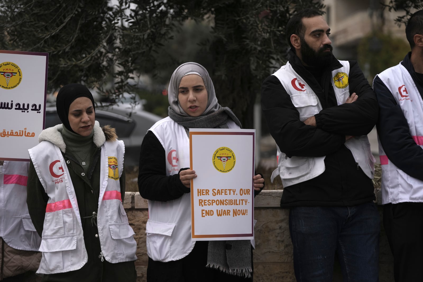 Members of the Palestinian Medical Relief Society mark the International Day for the Elimination of Violence Against Women, in the West Bank city of Bethlehem, Monday, Nov. 25, 2024. (AP Photo/Mahmoud Illean)