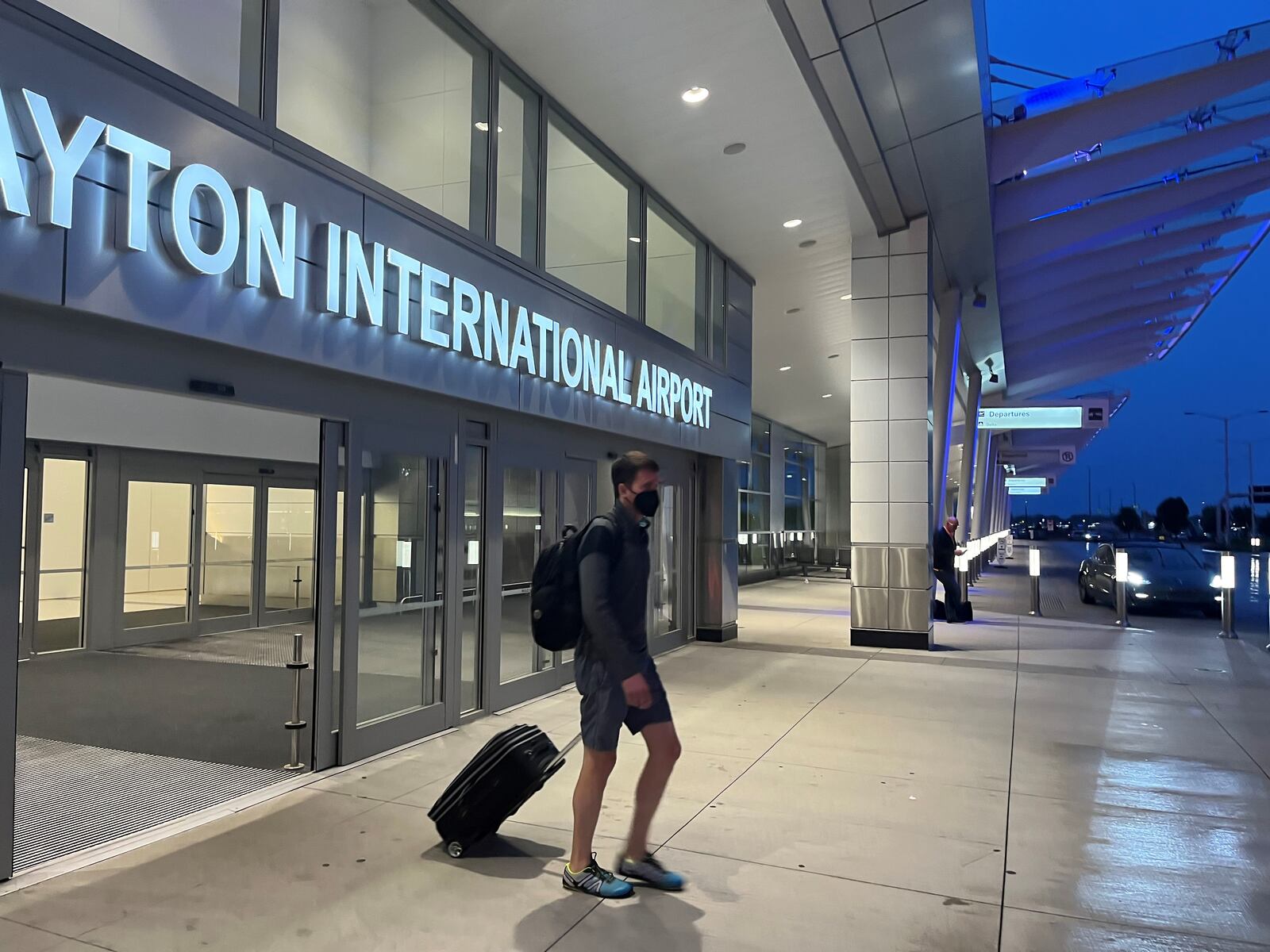 A passenger exits the Dayton International Airport. CORNELIUS FROLIK / STAFF