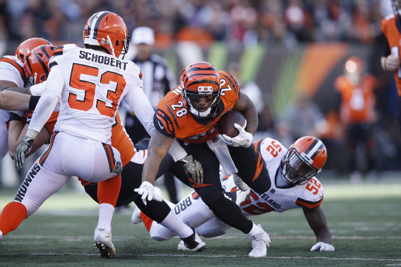 CINCINNATI, OH - NOVEMBER 26: Joe Mixon #28 of the Cincinnati Bengals runs the ball in the first half of a game against the Cleveland Browns at Paul Brown Stadium on November 26, 2017 in Cincinnati, Ohio. The Bengals won 30-16. (Photo by Joe Robbins/Getty Images)