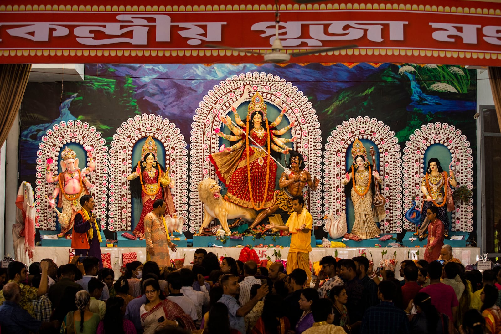 A tableau depicting the slaying of demon Mahishasura by the Hindu goddess Durga, center, is installed with other gods at Dhakeshwari National Temple during the Durgapuja festival in Dhaka, Bangladesh, on Oct. 10, 2024. (AP Photo/Rajib Dhar)