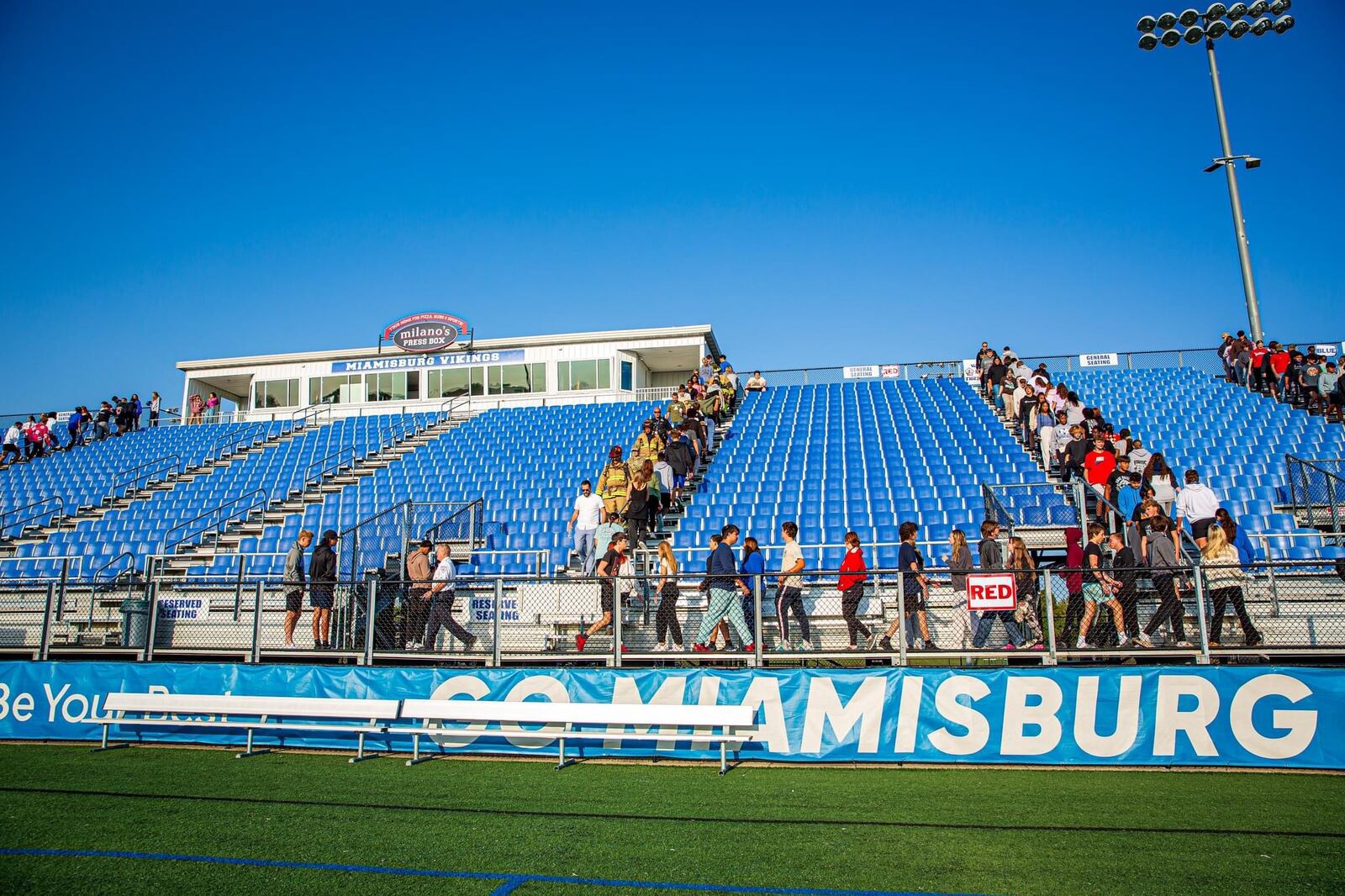 Miamisburg High School students and staffers, along with area first responders and active-duty U.S. military, walk up and down the bleachers at the school's Holland Field Monday, Sept. 9, 2024. The stair climb event paid tribute to the first responders who gave their lives to save those trapped in the World Trade Center’s Twin Towers in New York City during the Sept. 11, 2001 terrorist attacks. CONTRIBUTED