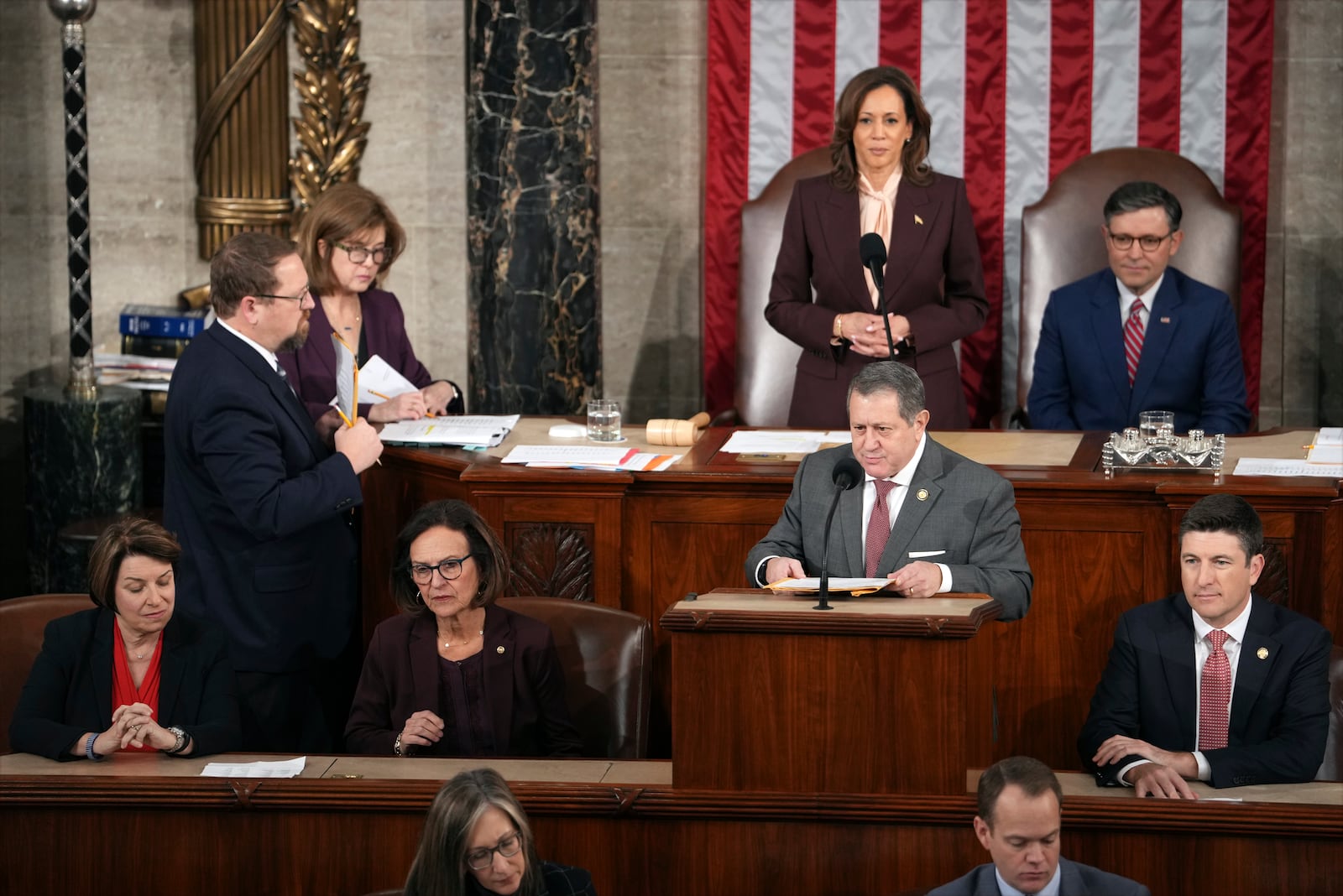 Vice President Kamala Harris and House Speaker Mike Johnson of La., listen as Rep. Bryan Stell, R-Wis., reads a certification during a joint session of Congress to confirm the Electoral College votes, affirming President-elect Donald Trump's victory in the presidential election, Monday, Jan. 6, 2025, at the U.S. Capitol in Washington. (AP Photo/Matt Rourke)