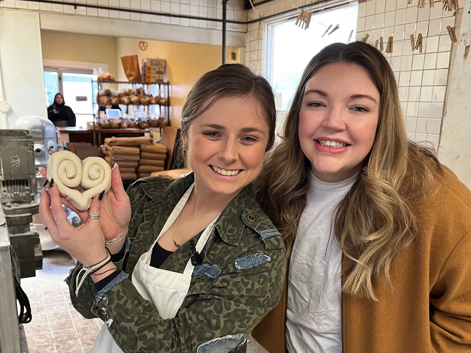 Reporter Natalie Jones with Emma Smales, the fifth generation owner of Smales Pretzel Bakery in Dayton.