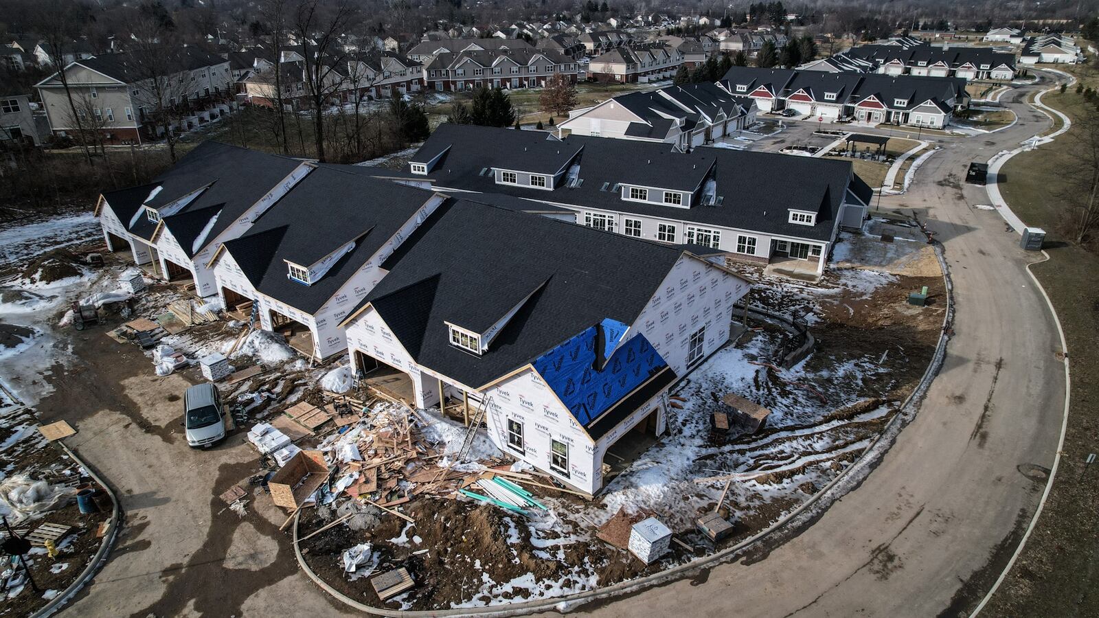 Townhomes are under construction at the Cottages of Beavercreek on County Line Rd., a Charles Simms Development project. Costs are driven up by supply chain problems that make it harder to get some products, including for home construction. JIM NOELKER/STAFF