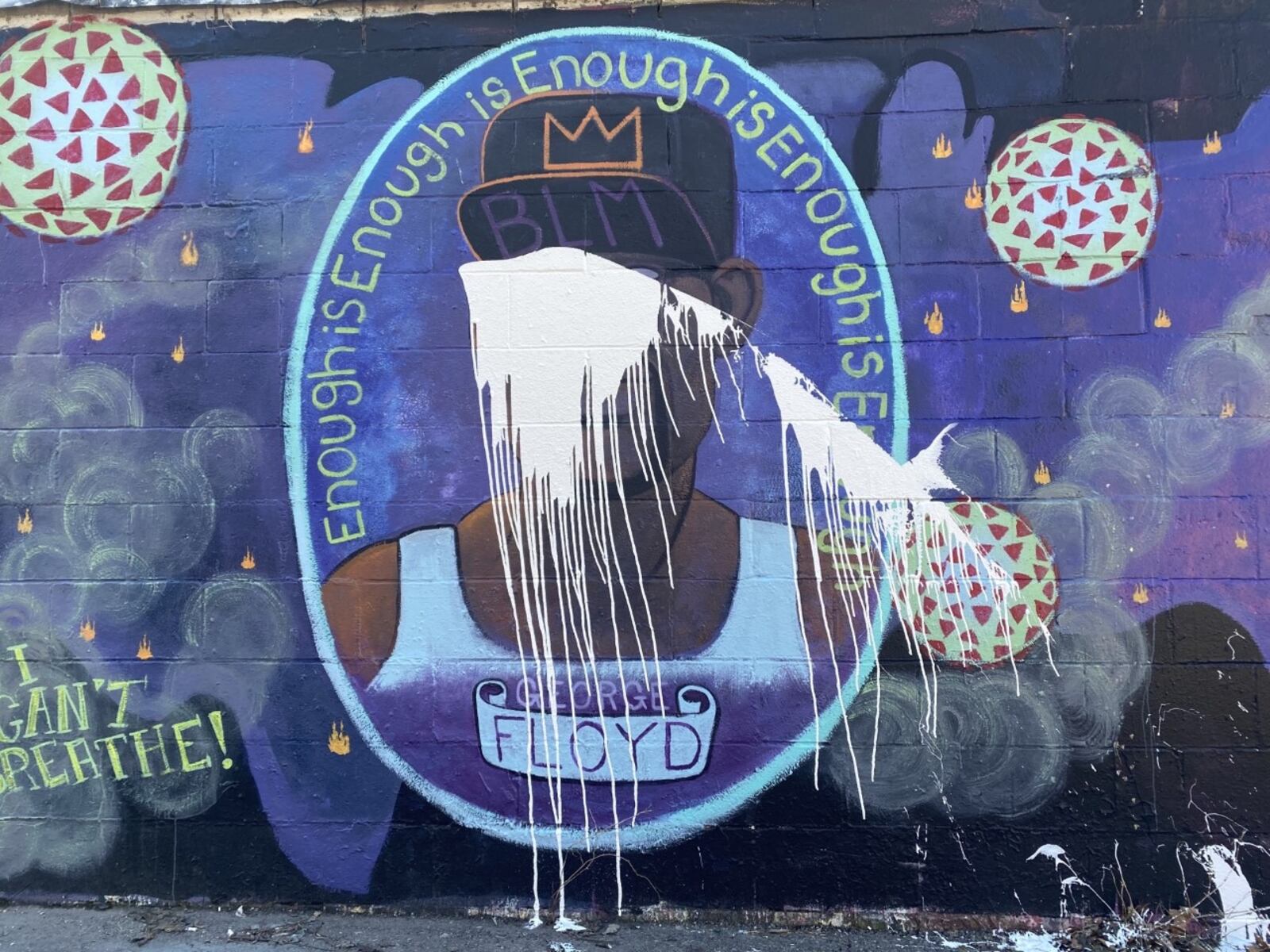 White paint was splattered over a George Floyd mural in Yellow Springs sometime on Sunday night, said Yellow Springs Police Chief Brian Carlson. EILEEN McCLORY STAFF