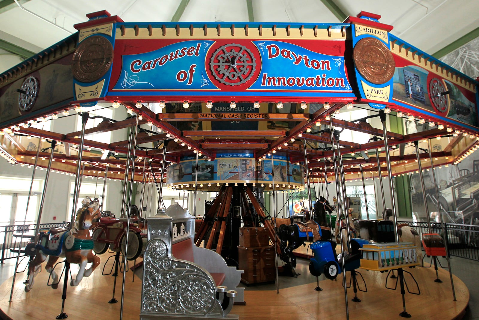 The Carousel of Dayton Innovation, at Carillon Historical Park, is a whimsical ride made of 32 hand-carved figures from the Gem City’s history. LISA POWELL / STAFF