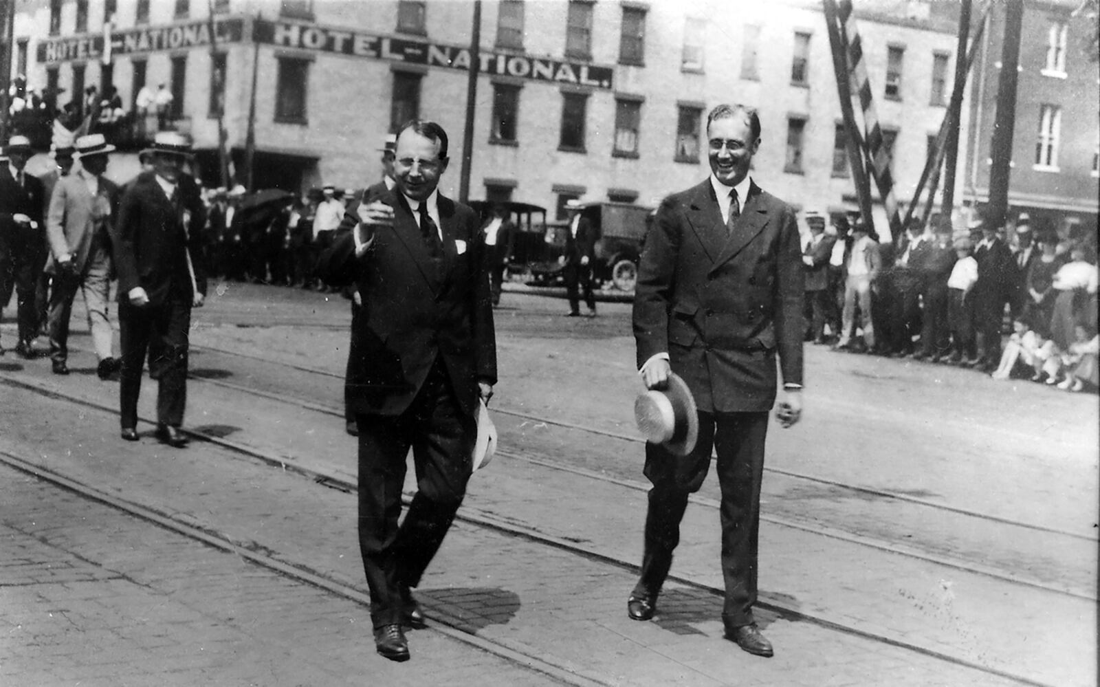 With Franklin D. Roosevelt (right) as his running mate, Gov. James M. Cox (left) campaigns in Dayton against fellow Ohioan Warren G. Harding. The election outcome would decide the successor to President Woodrow Wilson. DAYTON DAILY NEWS ARCHIVE