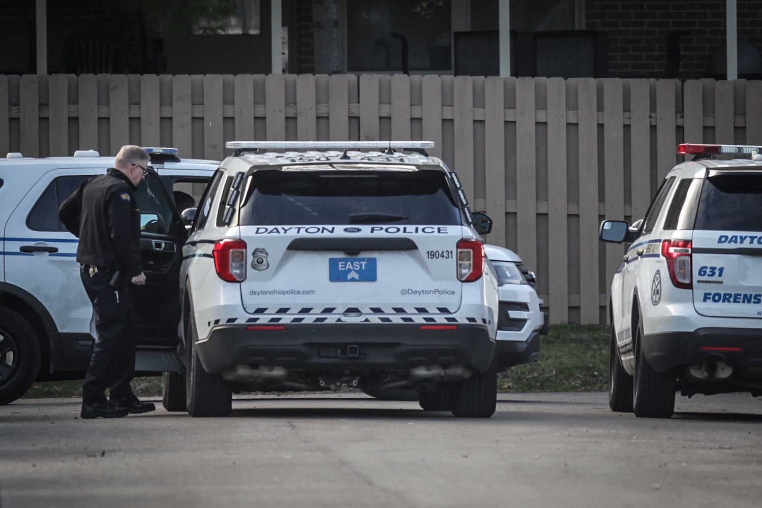 PHOTOS: Murder suspect in custody after standoff, police say