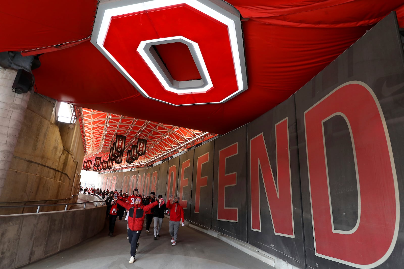 Ohio State Buckeyes fans enter the field before the National Championship celebration at Ohio Stadium in Columbus, Ohio, Sunday, Jan. 26, 2025. (AP Photo/Joe Maiorana)