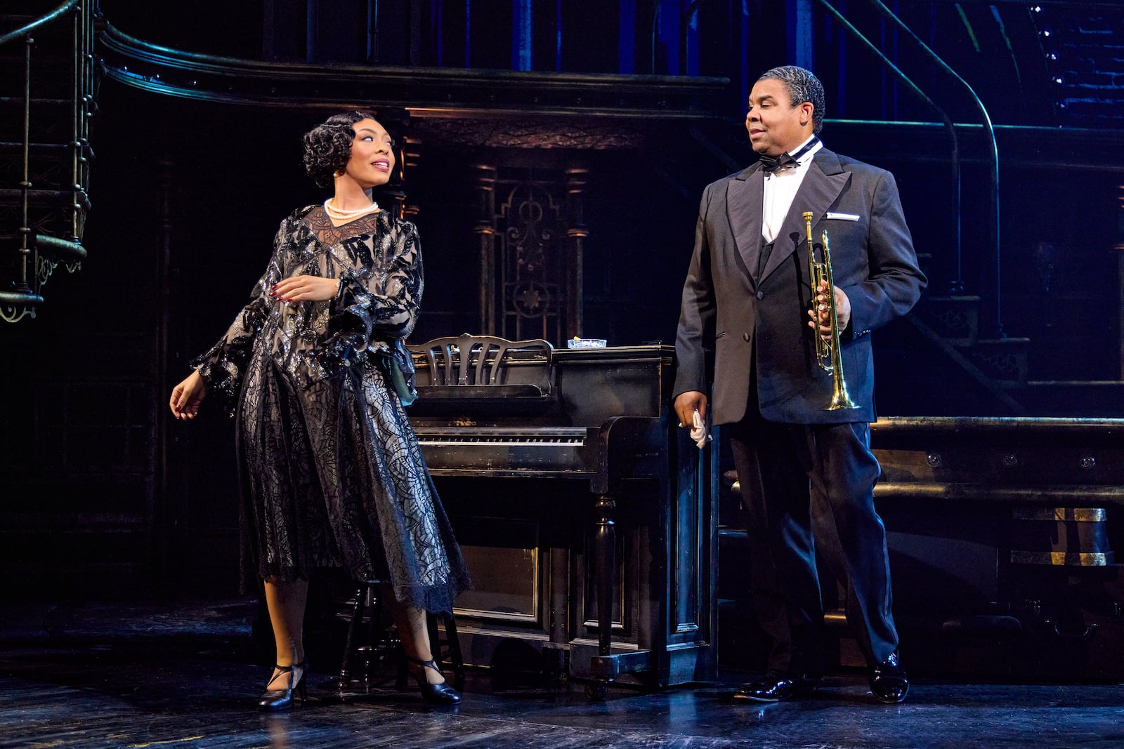 Jennie Harney-Fleming portrays Lil Hardin, left, and James Monroe Iglehart portrays Louis Armstrong during a performance in "A Wonderful World: The Louis Armstrong Musical" in New York. (Jeremy Daniel via AP)