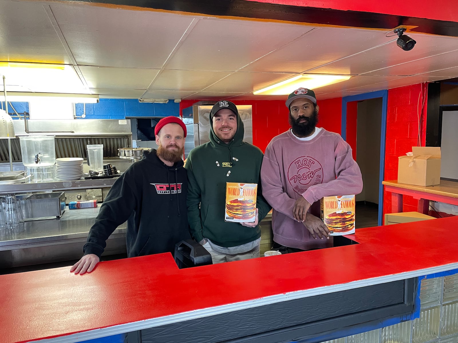 Blazin’ Dayton and Uncle Boof’s World Famous Pancake Mix are teaming up to open a commercial kitchen space at 115 Springfield St. in Dayton as they work to expand their businesses. Pictured (left to right) is Mason Schingler, Zach Jeckering and Dexter Clay.