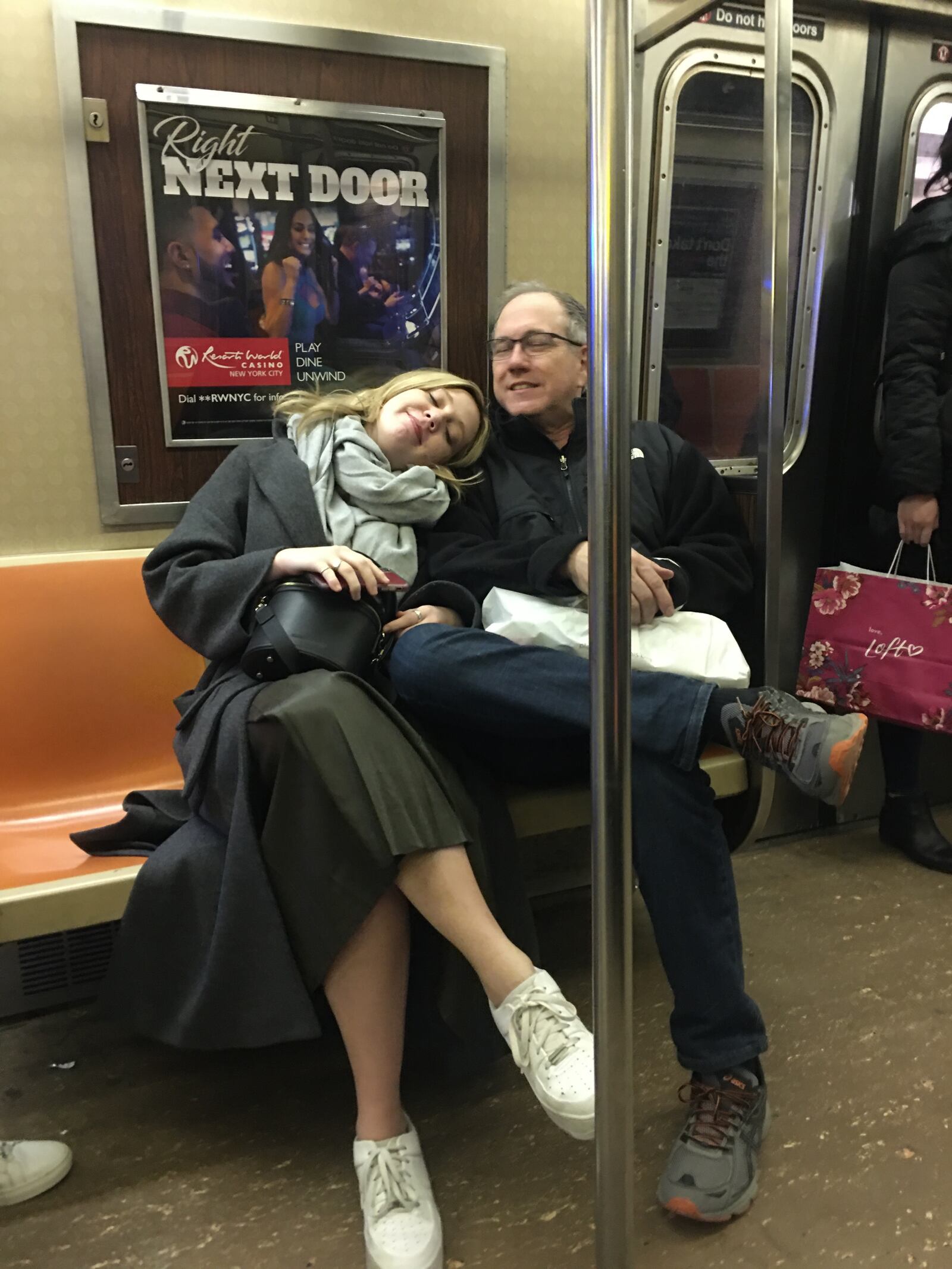 Oregon district resident Amy and Kevin Deal  became ill after a trip to New York. They suspect they had the coronavirus. Kevin Deal is pictured riding the subway during that trip with his daughter,  Grace Deal.