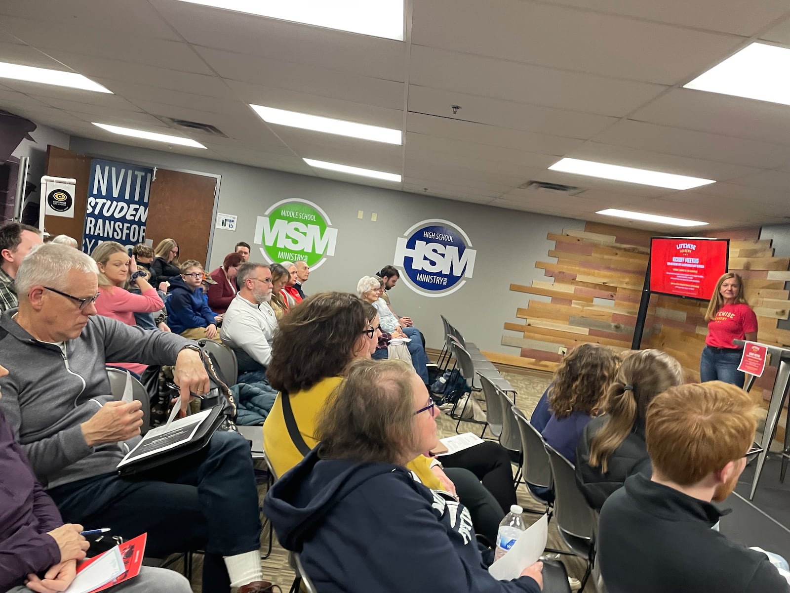 A First Baptist Church of Kettering member (at the far right near the read screen) was one of the presenters during a Jan. 25 LifeWise Academy meeting for residents of the Centerville and Kettering school districts. NICK BLIZZARD/STAFF