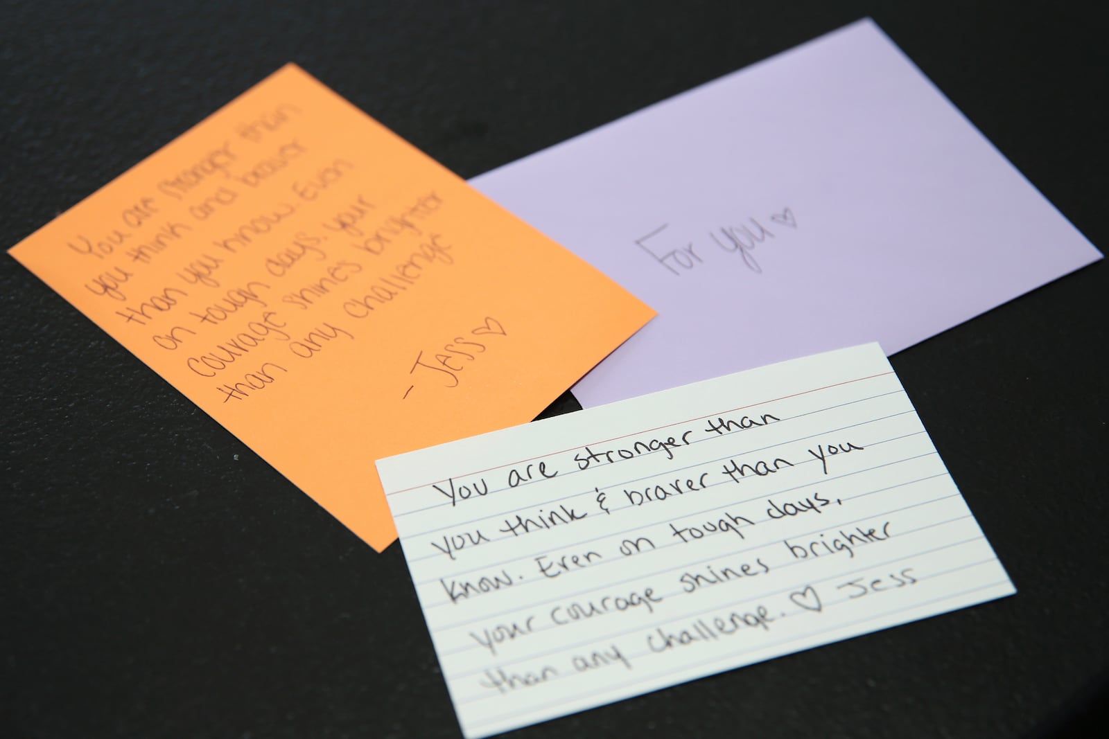 Support letters for middle school girls made by staff are displayed at Libera in Morgantown, W.Va., Thursday, Feb., 6 2025. (AP Photo/Kathleen Batten)