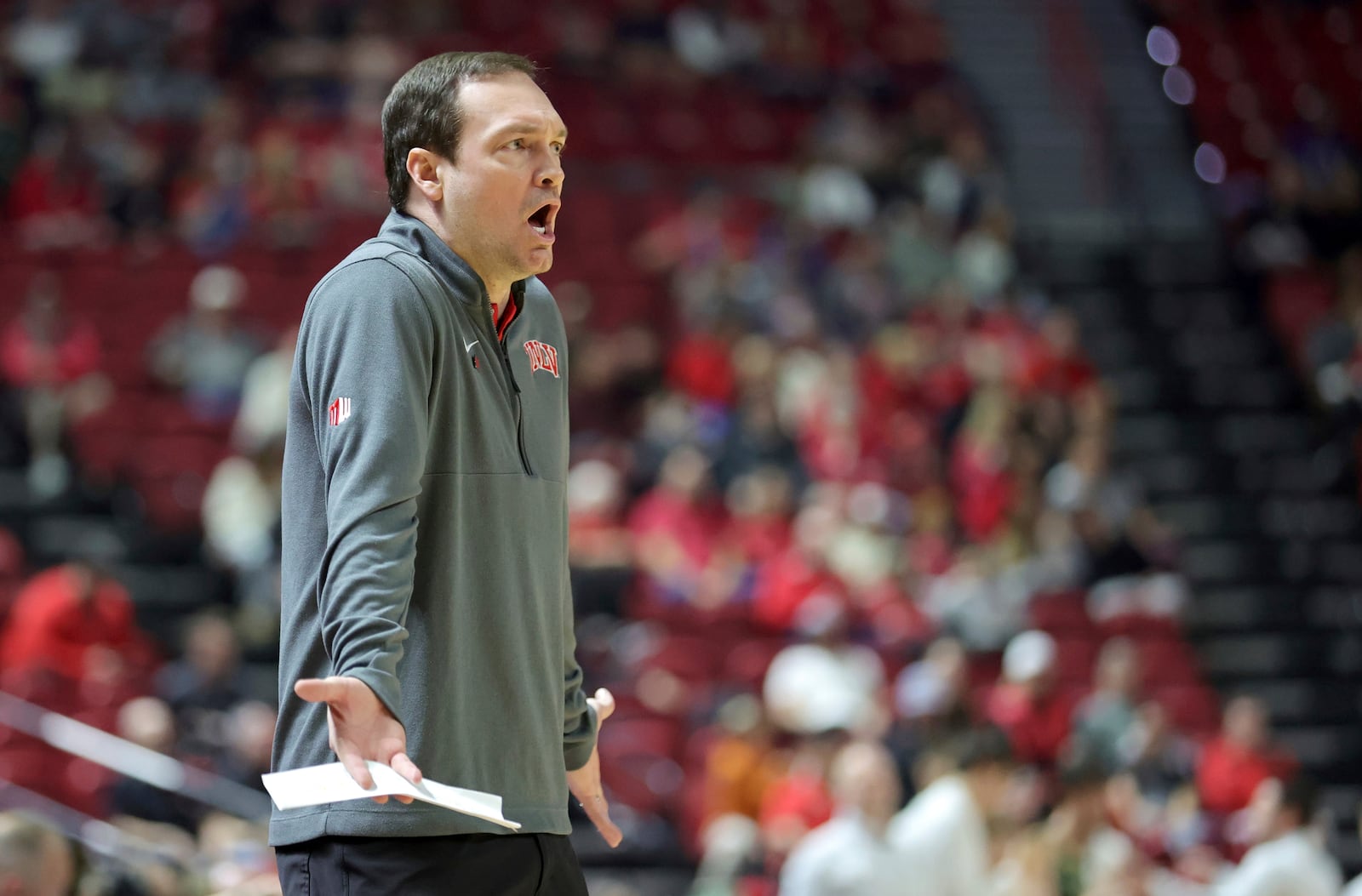 UNLV head coach Kevin Kruger reacts to an official's call during the first half of an NCAA basketball game against Colorado State Saturday, Feb. 22, 2025, in Las Vegas. (Steve Marcus/Las Vegas Sun via AP)