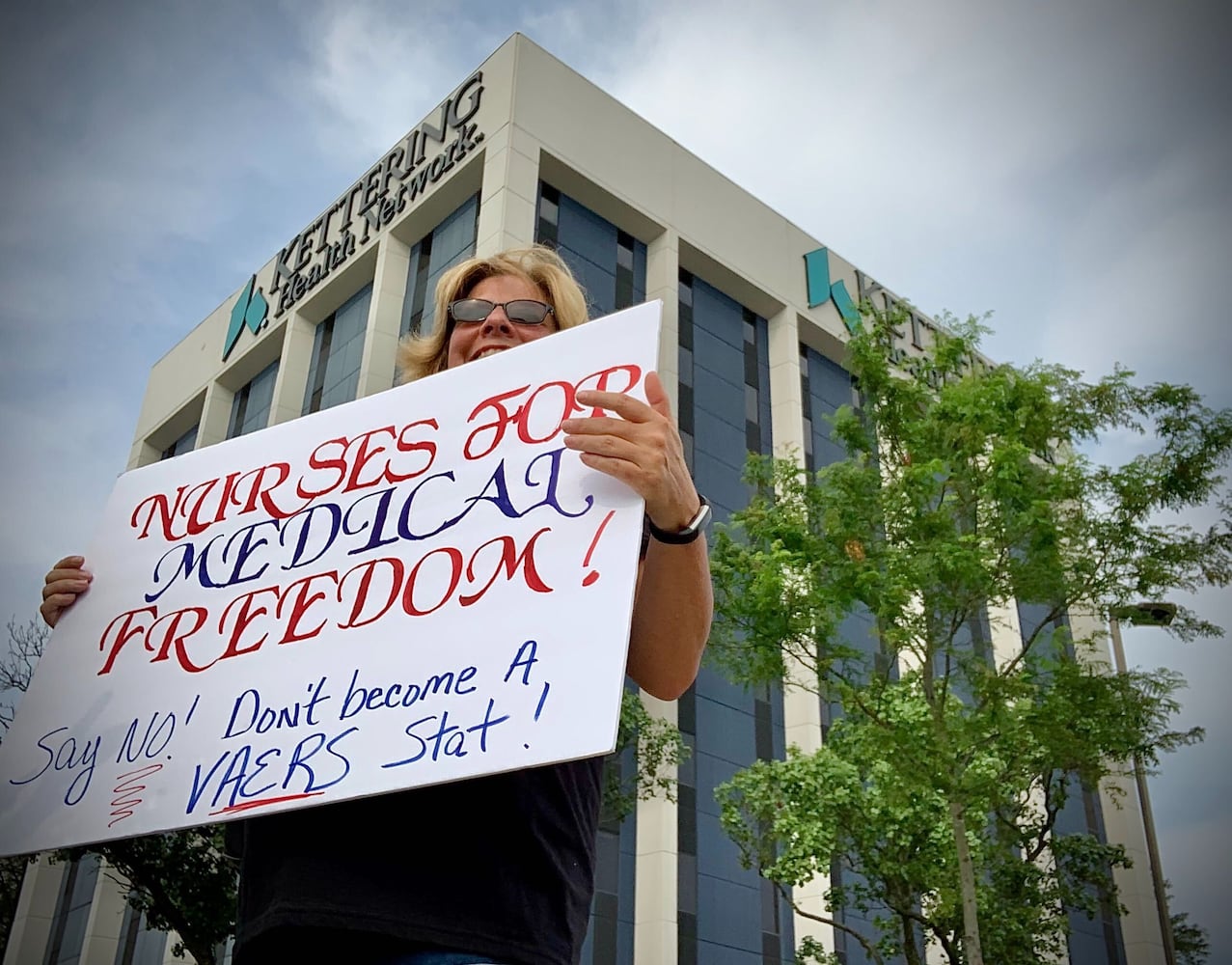 PHOTOS: Crowd gathers to protest COVID vaccine at Kettering Health