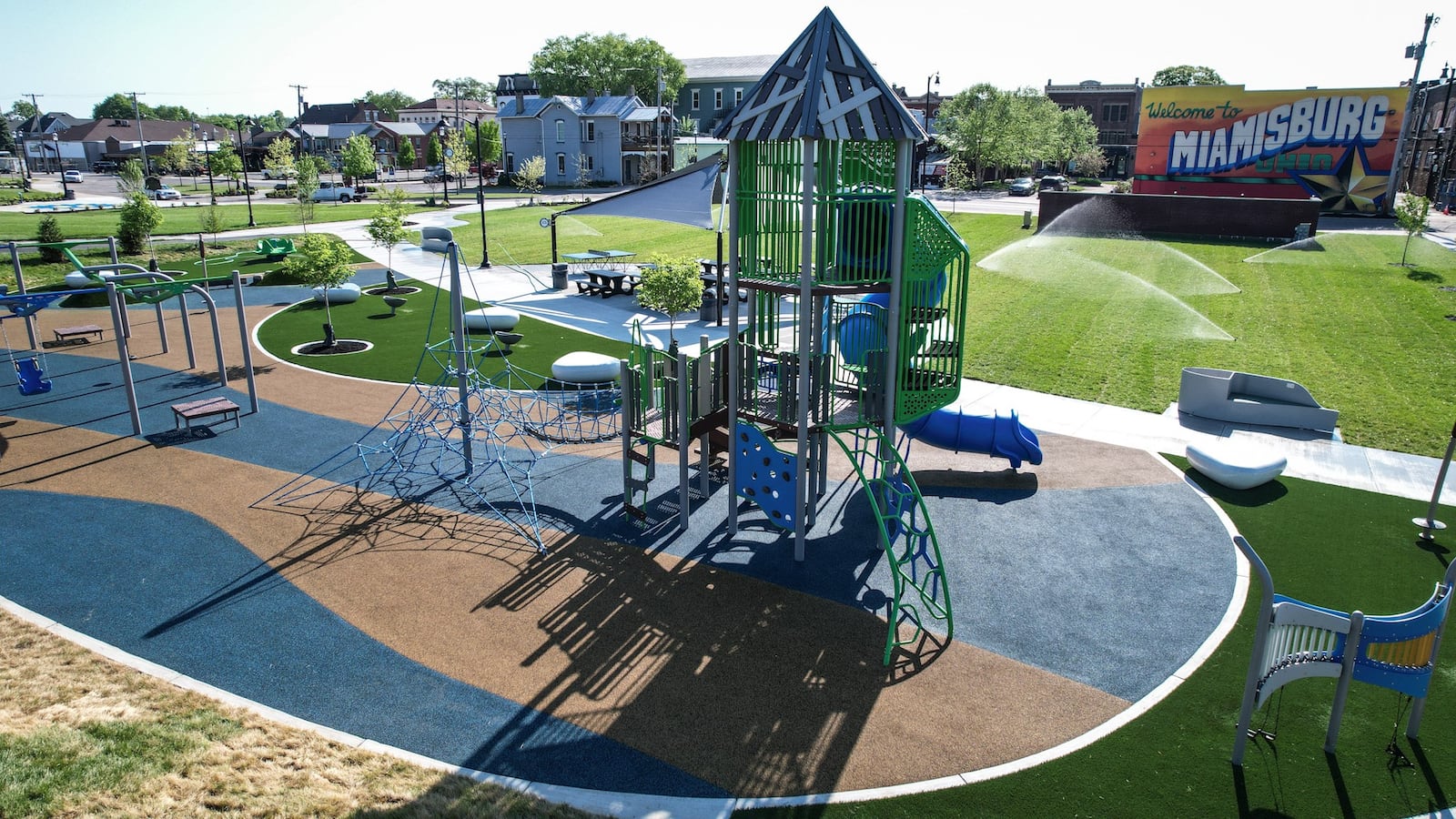 Miamisburg's Riverfront Park recently underwent a $5.5 million, yearlong revamp that added a 7,600-square-foot playground and an amphitheater, among other new features. It was recently announced that the park was a key reason the city won two Ohio Parks and Recreation Association awards. JIM NOELKER/STAFF