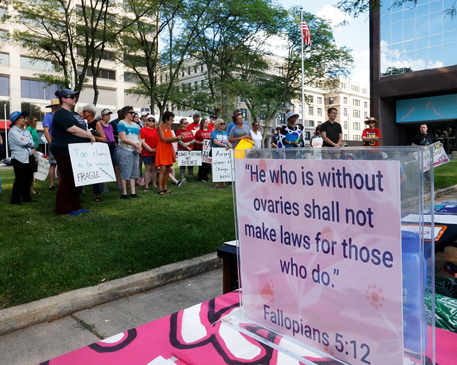 Approximately 100 people turned out Monday, June 24, 2024 at the Federal Building in Dayton to protest anti-abortion efforts across the country and the Supreme Court's Dobbs decision from two years ago. MARSHALL GORBY\STAFF