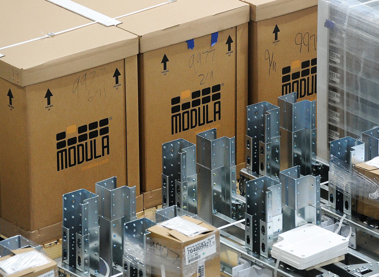 MODULA Inc. builds storage and management systems to reduce storage space and provide real-time visibility into inventory status, maintenance requirements and other key operational parameters. MARSHALL GORBY\STAFF